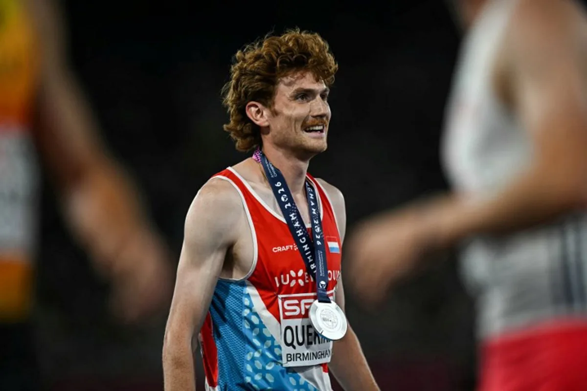 Silver medallist Luxembourg's Ruben Querinjean celebrates after competing in the men's 3000m steeplechase final during the European Athletics Championships at Alexander Stadium in Birmingham on August 16, 2026.  Paul ELLIS / AFP
