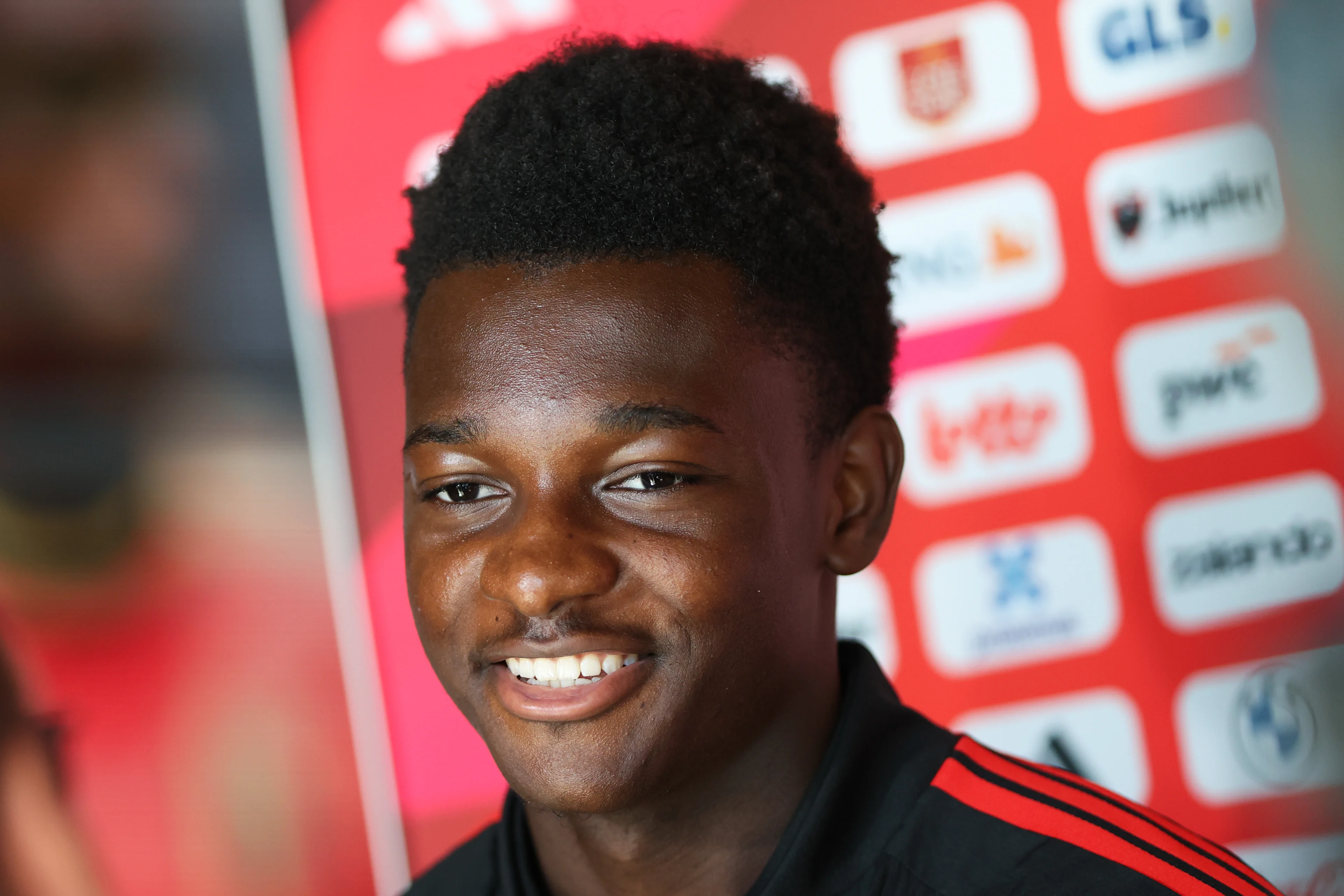 Belgium's Jesse Bisiwu talks to the press ahead of a press conference of the Red Devils U21 youth team, the Belgian youth national soccer team, at the national training center in Tubize, Wednesday 23 September 2026. The team is preparing for fixtures in the Euro 2027 qualifiers games. BELGA PHOTO BRUNO FAHY