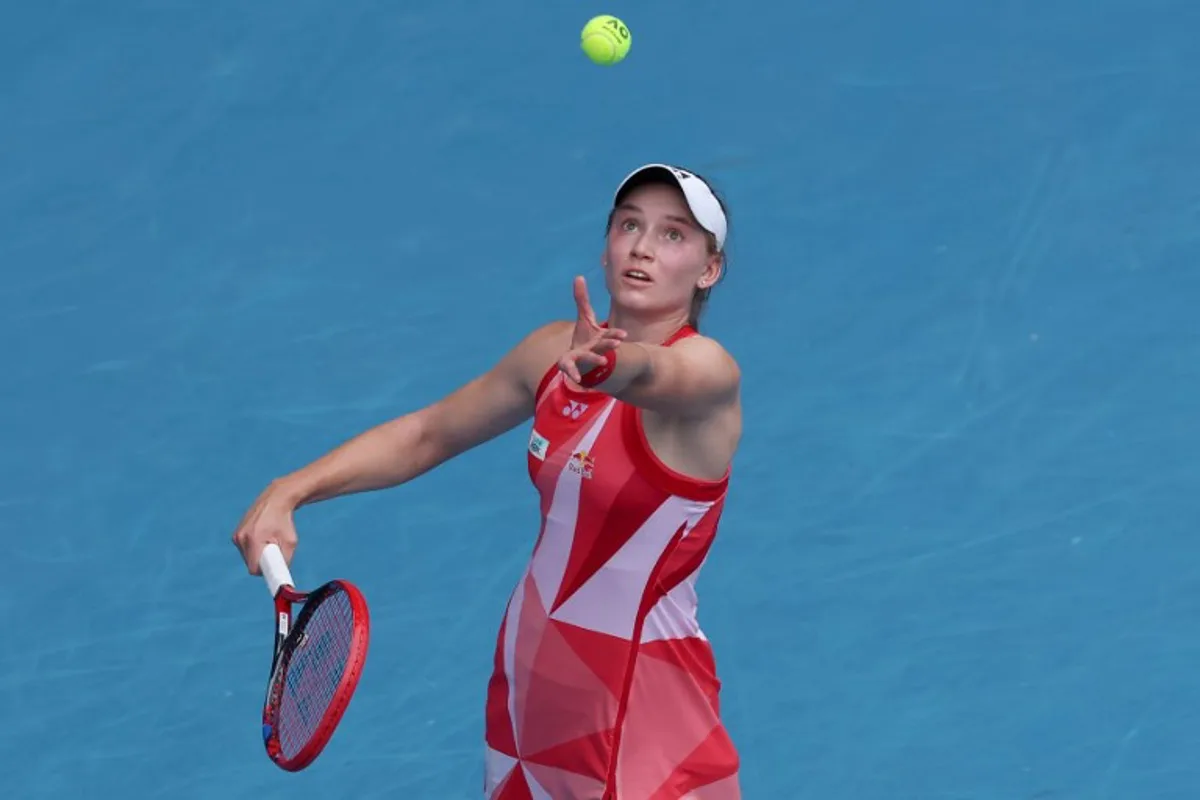 Kazakhstan's Elena Rybakina serves against USA's Madison Keys during their women's singles match on day nine of the Australian Open tennis tournament in Melbourne on January 20, 2025.  DAVID GRAY / AFP