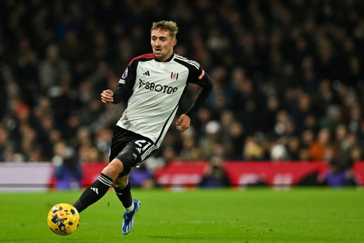 Fulham's Belgian defender #21 Timothy Castagne controls the ball during the English Premier League football match between Fulham and Wolverhampton Wanderers at Craven Cottage, in London, on November 27, 2023.  Glyn KIRK / AFP