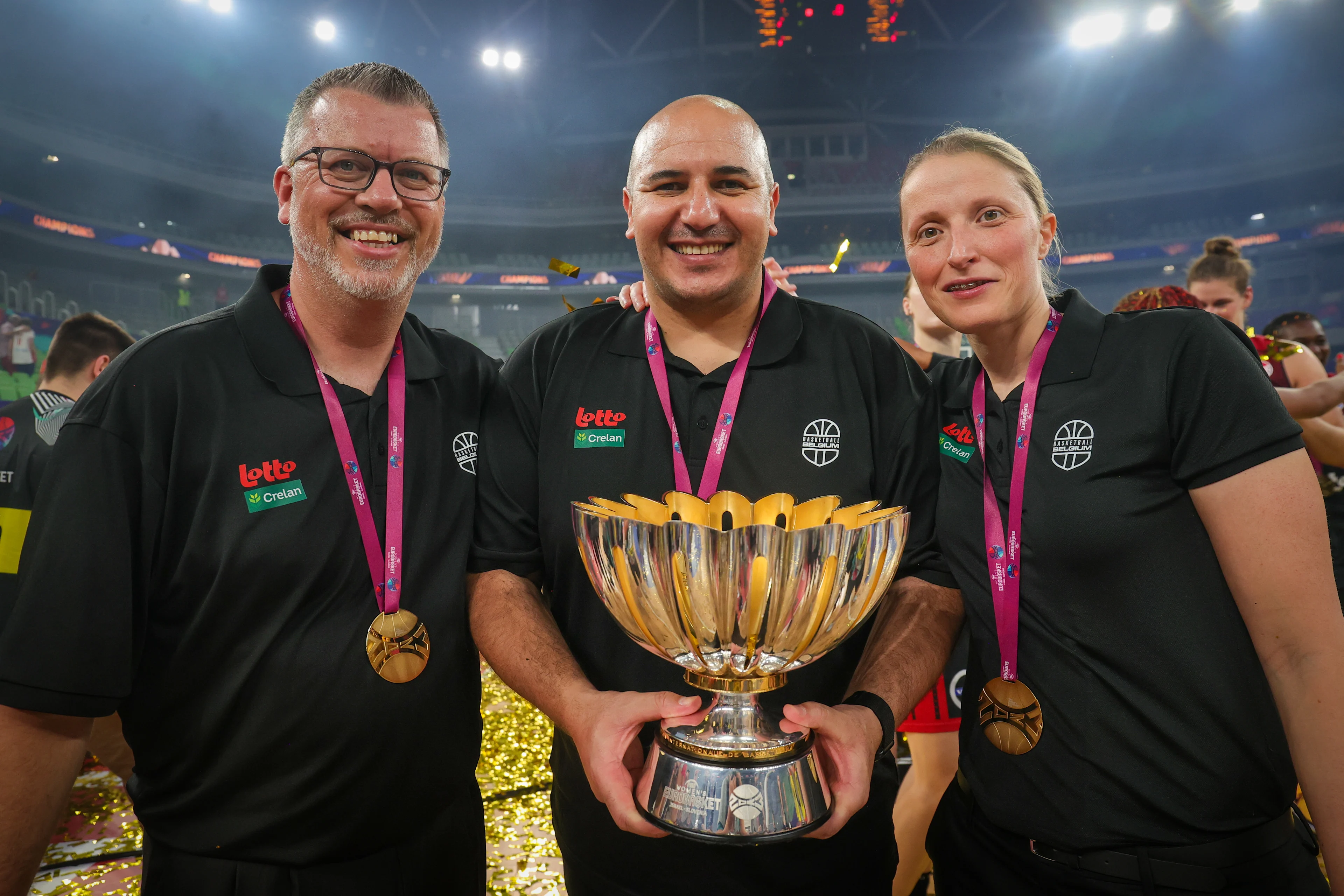 Belgium's assistant coach Pascal Angillis, Belgium's head coach Rachid Meziane and Belgium's assistant coach Jill Lorent celebrate after winning the final basketball game between Belgian national women's team 'the Belgian Cats' and Spain, in Ljubljana, Slovenia on Sunday 25 June 2023, at the FIBA Women EuroBasket 2023 European Championships in Israel and Slovenia. It is the first final ever for Belgium. BELGA PHOTO VIRGINIE LEFOUR