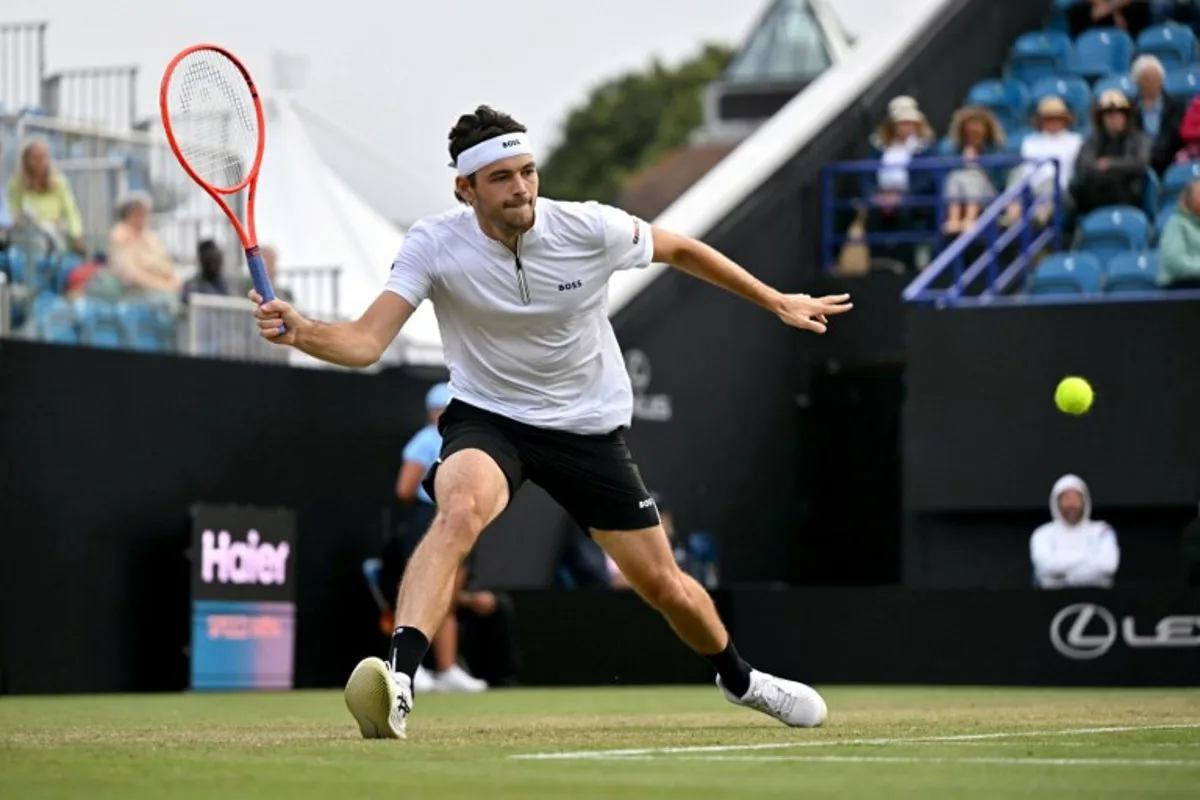 US player Taylor Fritz returns against Spain's Alejandro Davidovich during their men's singles semi final tennis match on day five at the Lexus Eastbourne International tennis tournament in Eastbourne, southern England, on June 27, 2025. Glyn KIRK / AFP