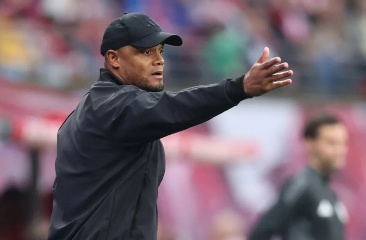Bayern Munich's Belgian head coach Vincent Kompany gestures during the German first division Bundesliga football match between RB Leipzig and FC Bayern Munich in Leipzig, eastern Germany on May 3, 2025. RONNY HARTMANN / AFP