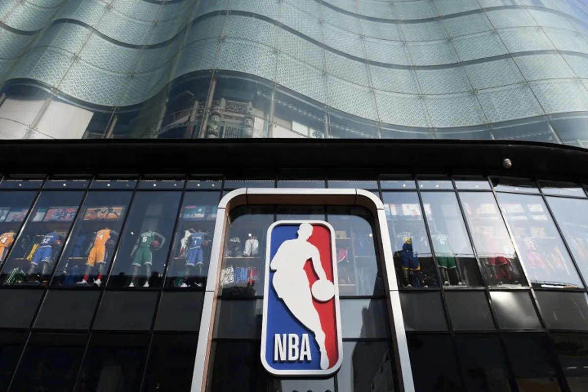 The National Basketball Association (NBA) store is seen in Beijing on October 9, 2019. Chinese state media slammed the NBA for an "about-face" on October 9 after the body said it would not apologise for a tweet by the Houston Rockets General Manager supporting pro-democracy protests in Hong Kong. GREG BAKER / AFP