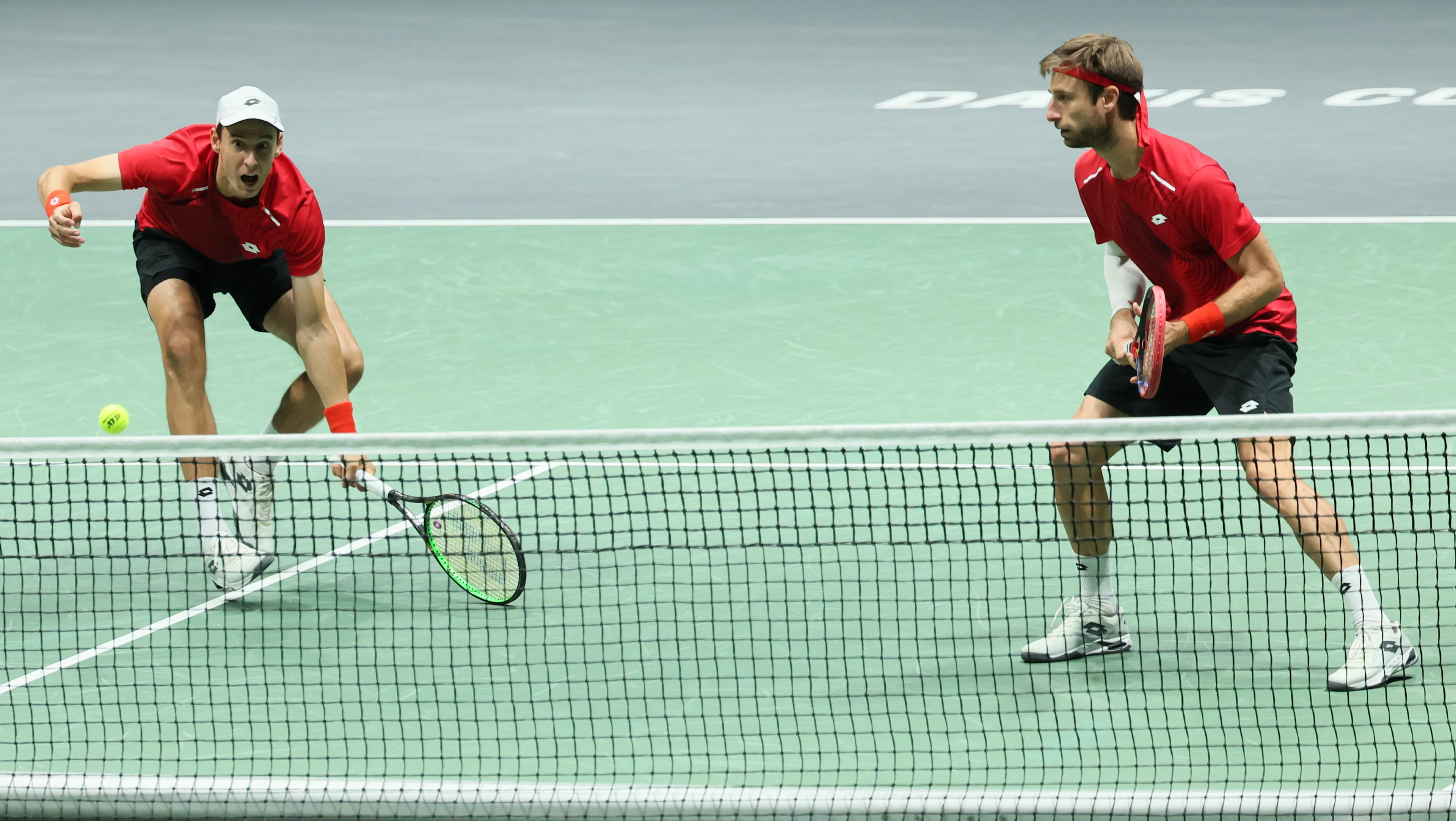 Belgian Sander Gille and Belgian Joran Vliegen pictured in action during the doubles game between Belgian Sander Gille/Joran Vliegen and Brazilian Rafael Matos/Felipe Meligeni Alves, the third match in the group A Davis Cup Finals group stage between Belgium and Brazil, Saturday 14 September 2024, at the Unipol Arena, in Bologna, Italy. BELGA PHOTO BENOIT DOPPAGNE