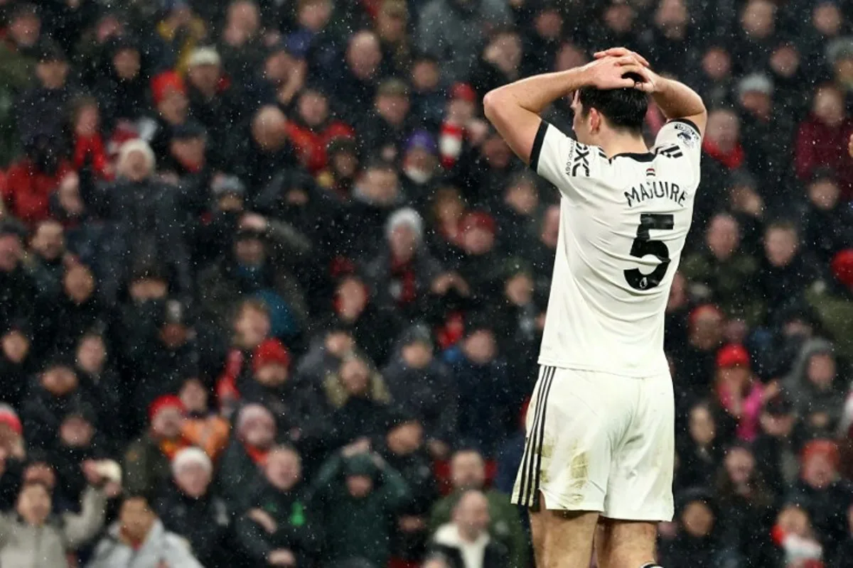 Manchester United's English defender #05 Harry Maguire reacts after missing a late chance during the English Premier League football match between Liverpool and Manchester United at Anfield in Liverpool, north west England on January 5, 2025.  Darren Staples / AFP