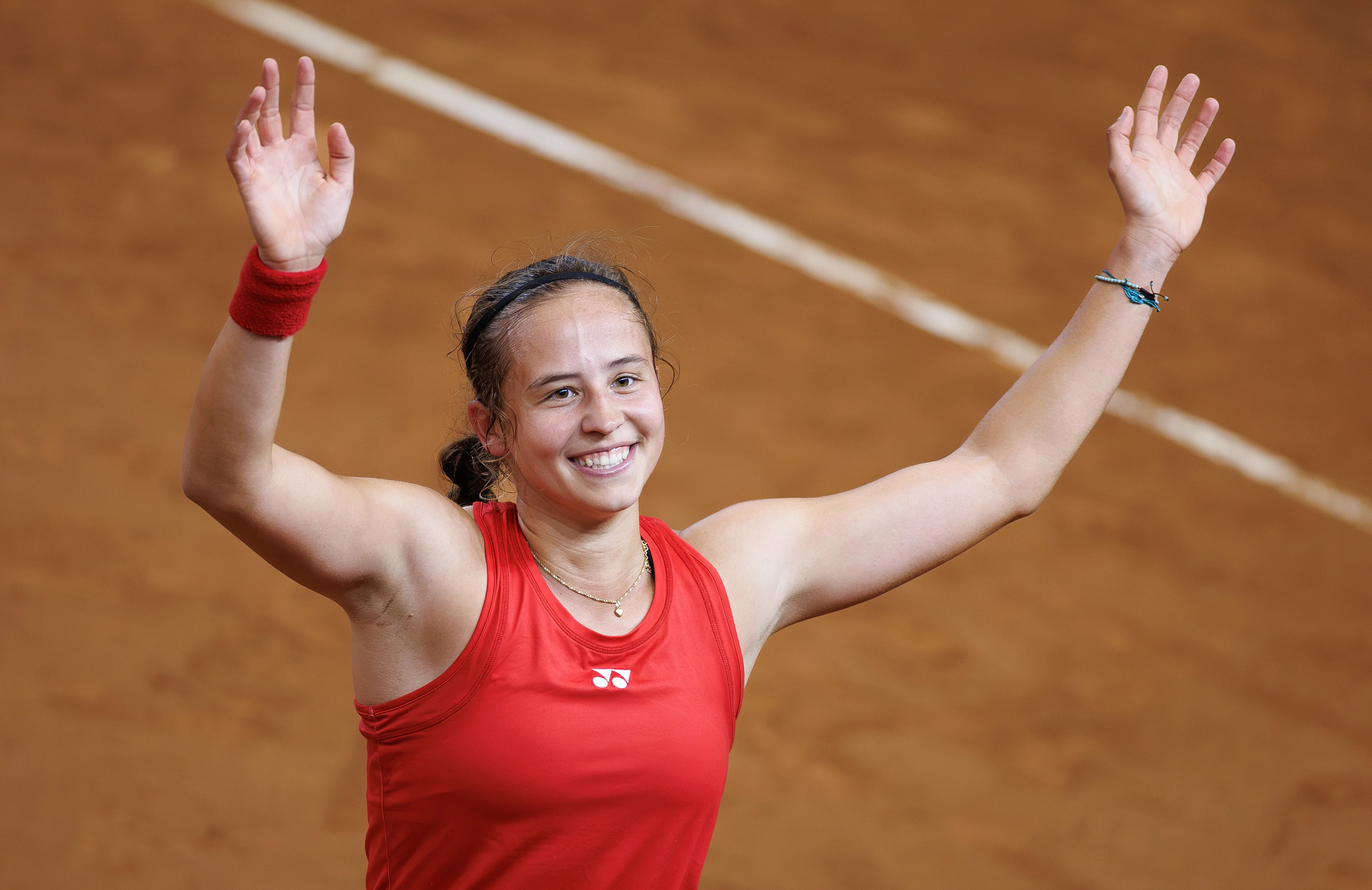 Belgian Hanne Vandewinkel celebrates after the first game between Belgian Vandewinkel (WTA 94) and US' Jovic (WTA 16) on the first day of tennis matches between Belgium and USA, in the qualifiers of the Billie Jean King Cup tennis, in Oostende, Belgium, on Friday 10 April 2026. The meeting takes place on 10 and 11th April. PHOTO BENOIT DOPPAGNE