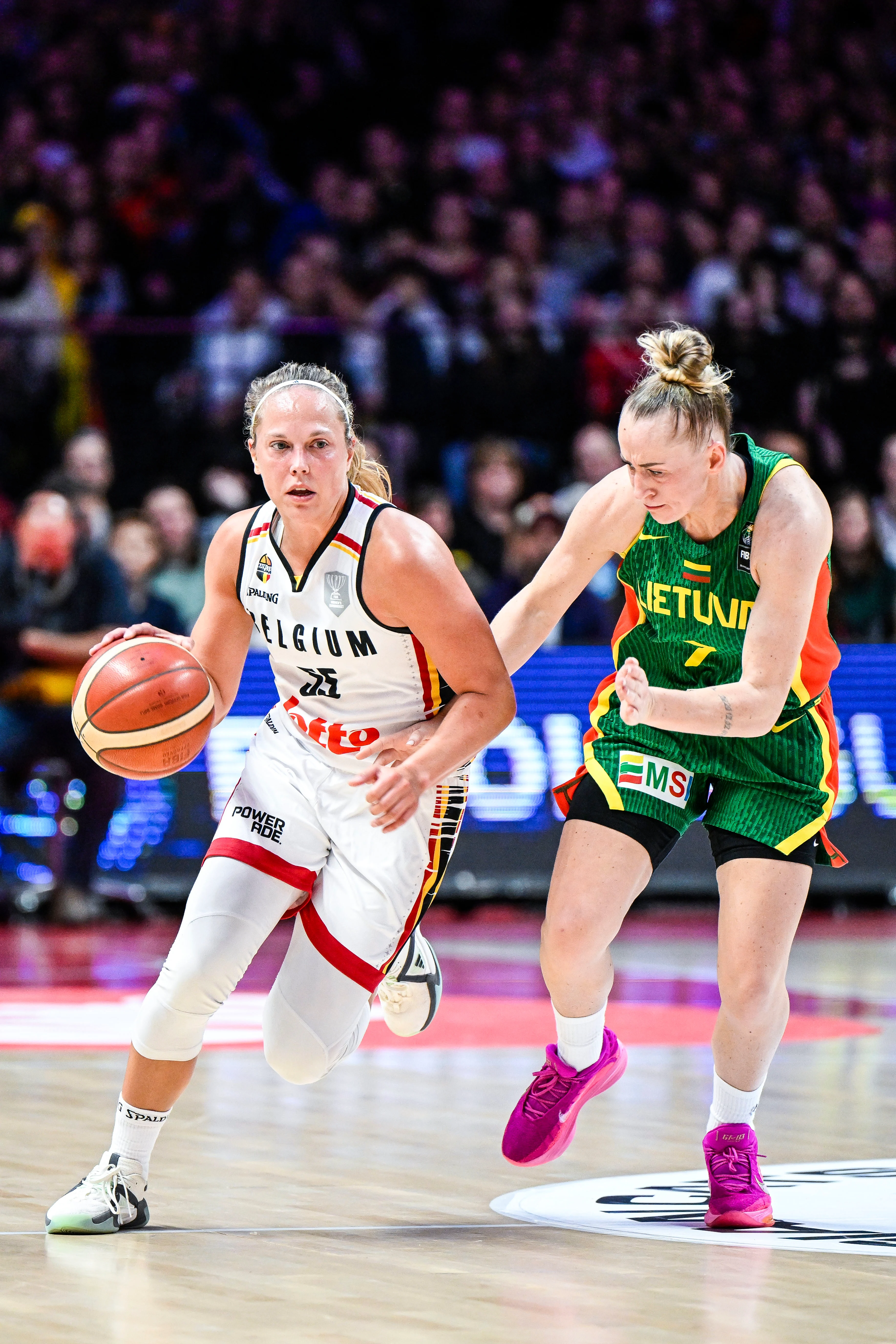 Belgium's Julie Allemand and Lithuania's Santa Baltkojiene pictured in action during a basketball game between Belgian national team the Belgian Cats and Lithunia, a qualification game (3/6) for the 2025 Eurobasket tournament, on Thursday 07 November 2024 in Antwerp, Belgium. BELGA PHOTO TOM GOYVAERTS