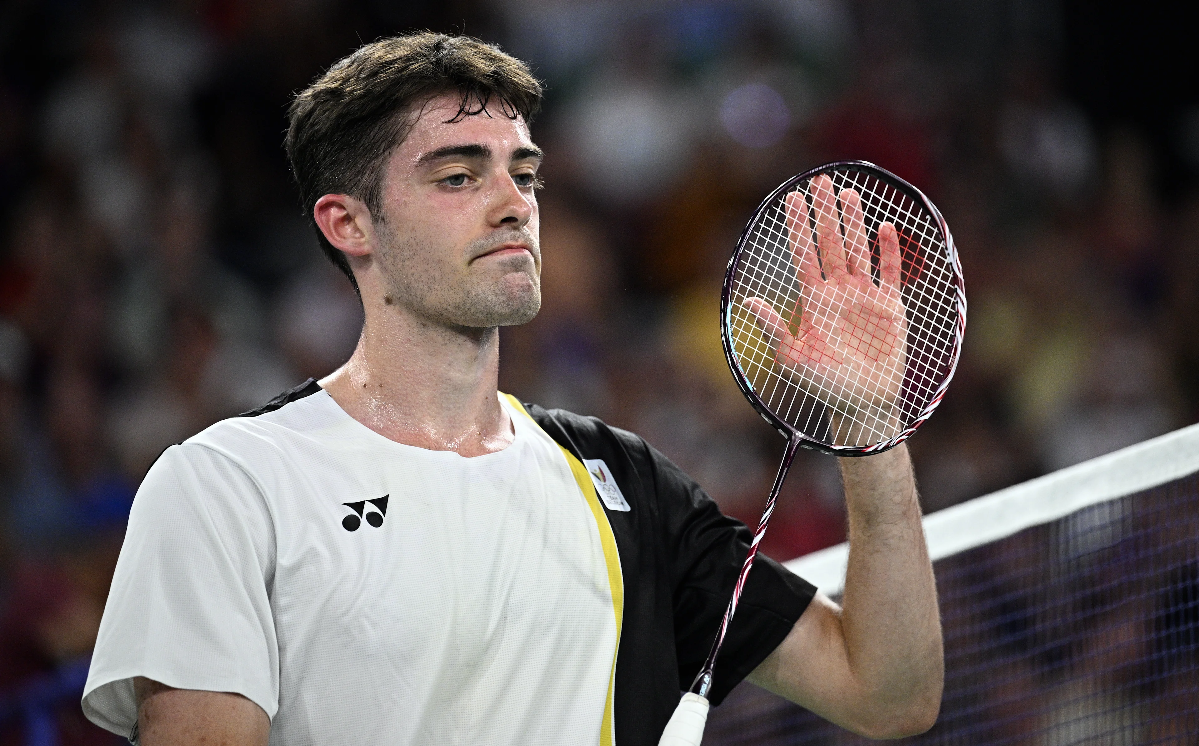 Belgian badminton player Julien Carraggi reacts during a badminton match against Indian Sen, in the group play stage of the men's singles tournament at the Paris 2024 Olympic Games, on Monday 29 July 2024 in Paris, France. The Games of the XXXIII Olympiad are taking place in Paris from 26 July to 11 August. The Belgian delegation counts 165 athletes competing in 21 sports. BELGA PHOTO JASPER JACOBS