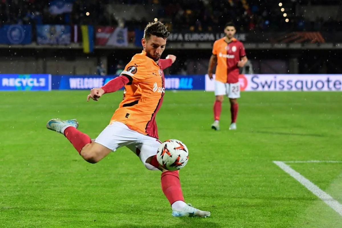 Galatasaray's Belgian forward #10 Dries Mertens kicks the ball during the UEFA Europa League football match between FK RFS and Galatasaray in Riga, Latvia on October 3, 2024.  GINTS IVUSKANS / AFP