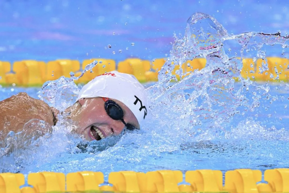 US' swimmer Katie Ledecky competes in a heat of the women's 800m freestyle swimming event during the 2025 World Aquatics Championships in Singapore on August 1, 2025. François-Xavier MARIT / AFP