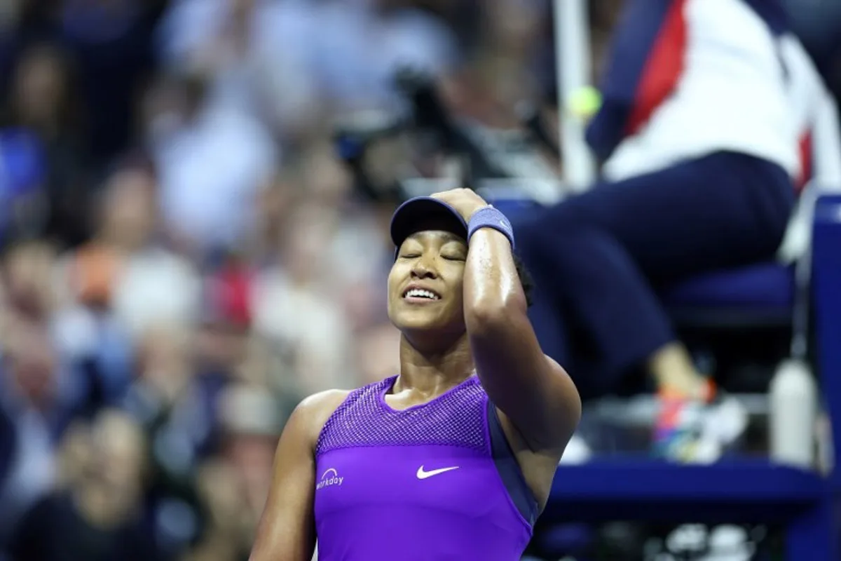 Japan's Naomi Osaka celebrates defeating Czech Republic's Karolina Muchova in their women's singles quarterfinal tennis match on day eleven of the US Open tennis tournament at the USTA Billie Jean King National Tennis Center in New York City on September 3, 2025. CHARLY TRIBALLEAU / AFP