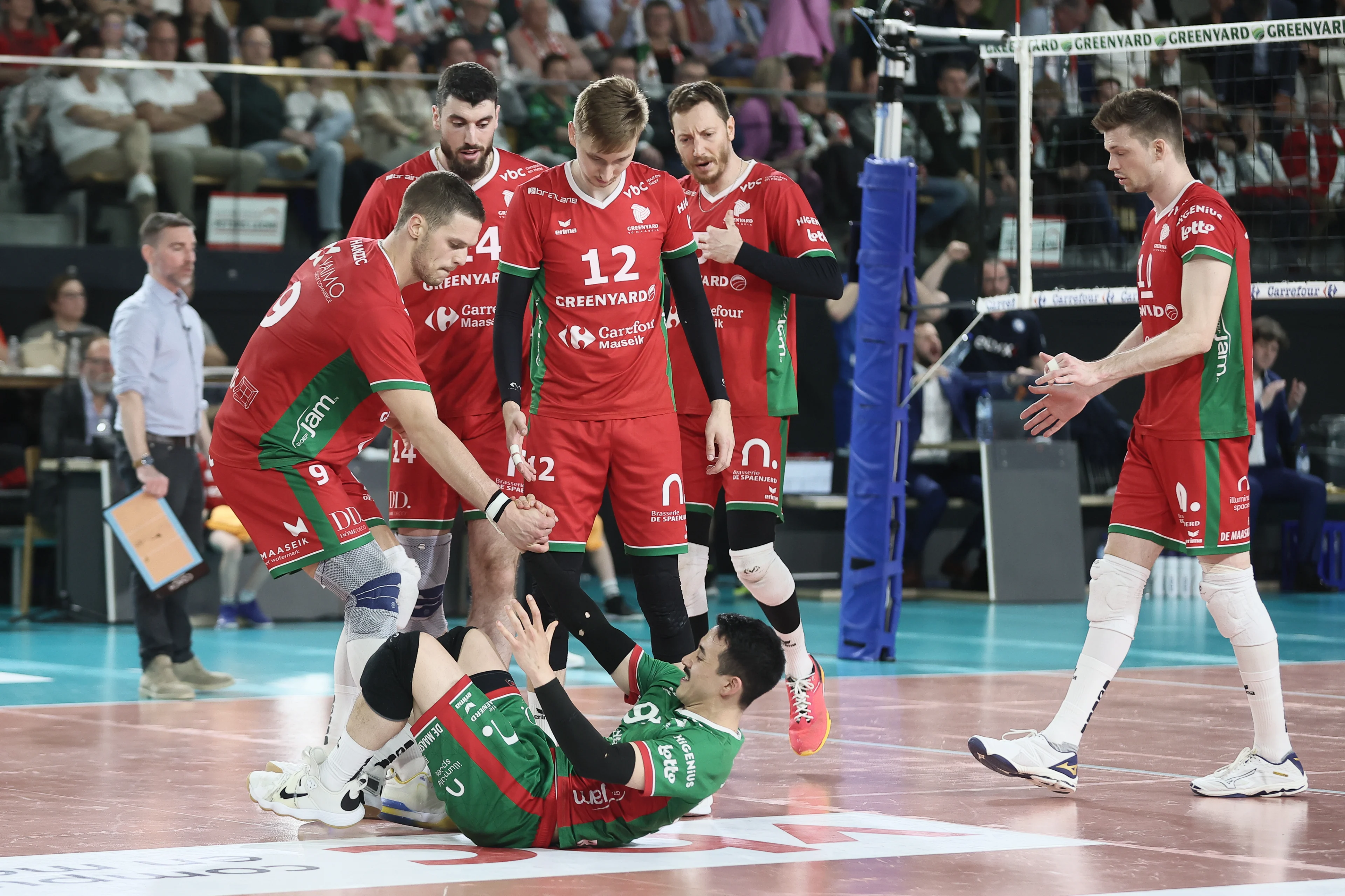 Maaseik's players pictured during a volleyball match between Greenyard Maaseik and Knack Roeselare, Sunday 28 April 2024 in Maaseik, the last match of the best-of-five finals in the Play Offs of the Belgian volleyball competition. BELGA PHOTO BRUNO FAHY