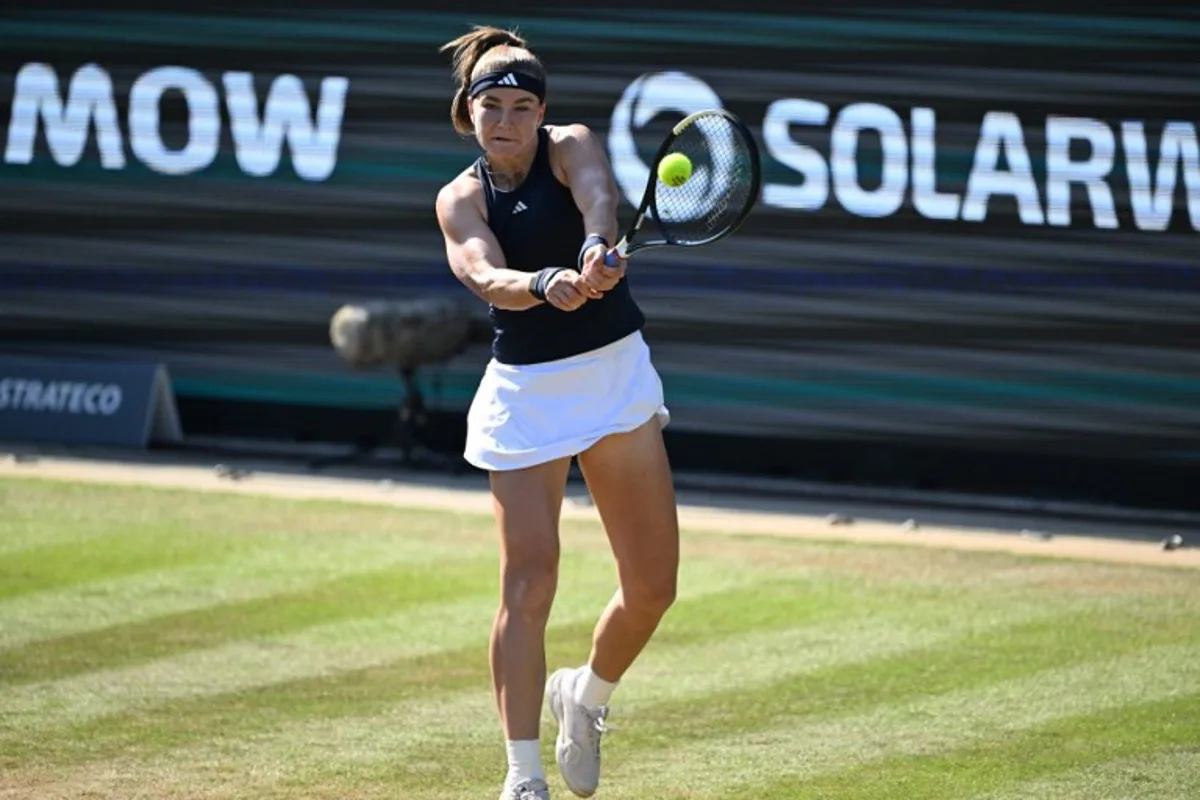 Czech Republic's Karolina Muchova returns the ball to Denmark's Clara Tauson during the women's singles quarter-final match of the WTA 500 Bad Homburg Open tennis tournament in Bad Homburg, western Germany on June 25, 2026.  Kirill KUDRYAVTSEV / AFP