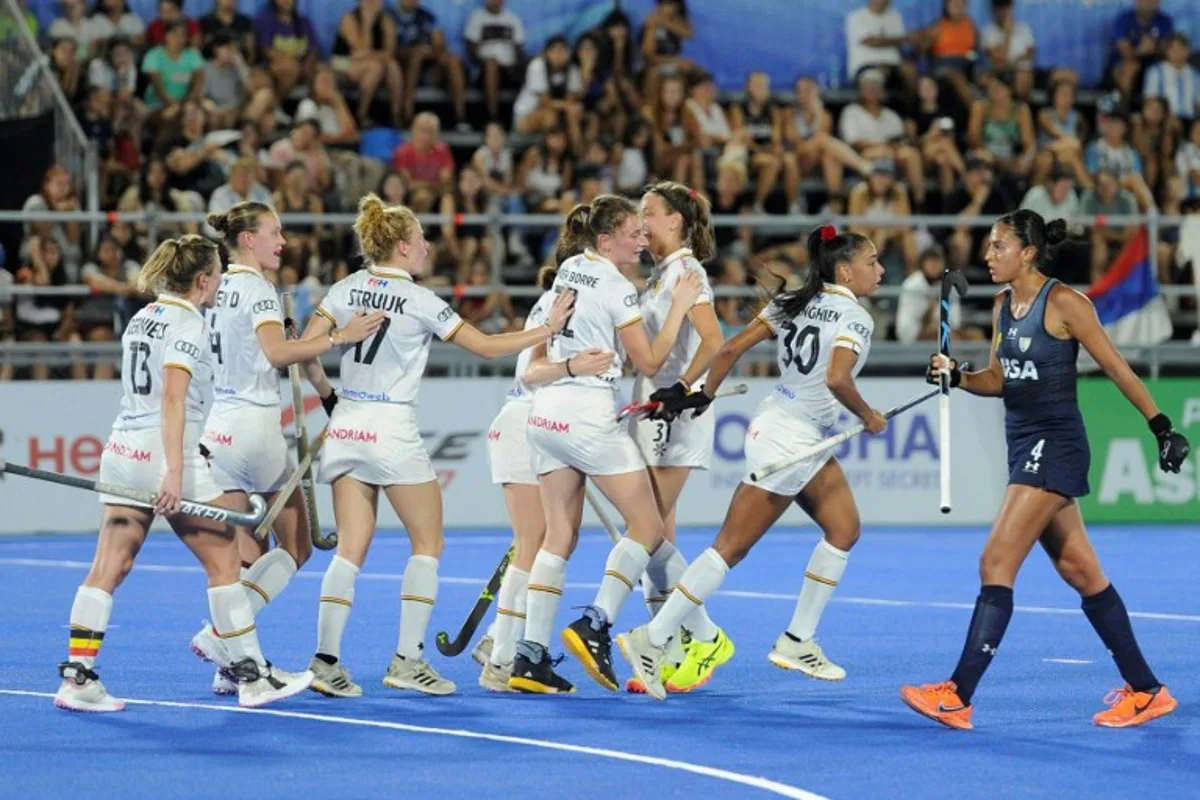 Belgium's #22 Stephanie Vanden Borre (C) celebrates with teammates after scoring a goal against Argentina during their FIH Pro League hockey match in Santiago del Estero, Argentina on February 19, 2025.  Eduardo RAPETTI / AFP