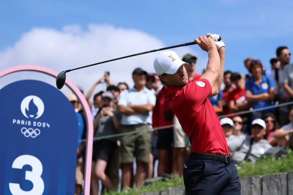 Belgium's Thomas Detry competes in round 4 of the men's golf individual stroke play of the Paris 2024 Olympic Games at Le Golf National in Guyancourt, south-west of Paris on August 4, 2024.   Emmanuel DUNAND / AFP