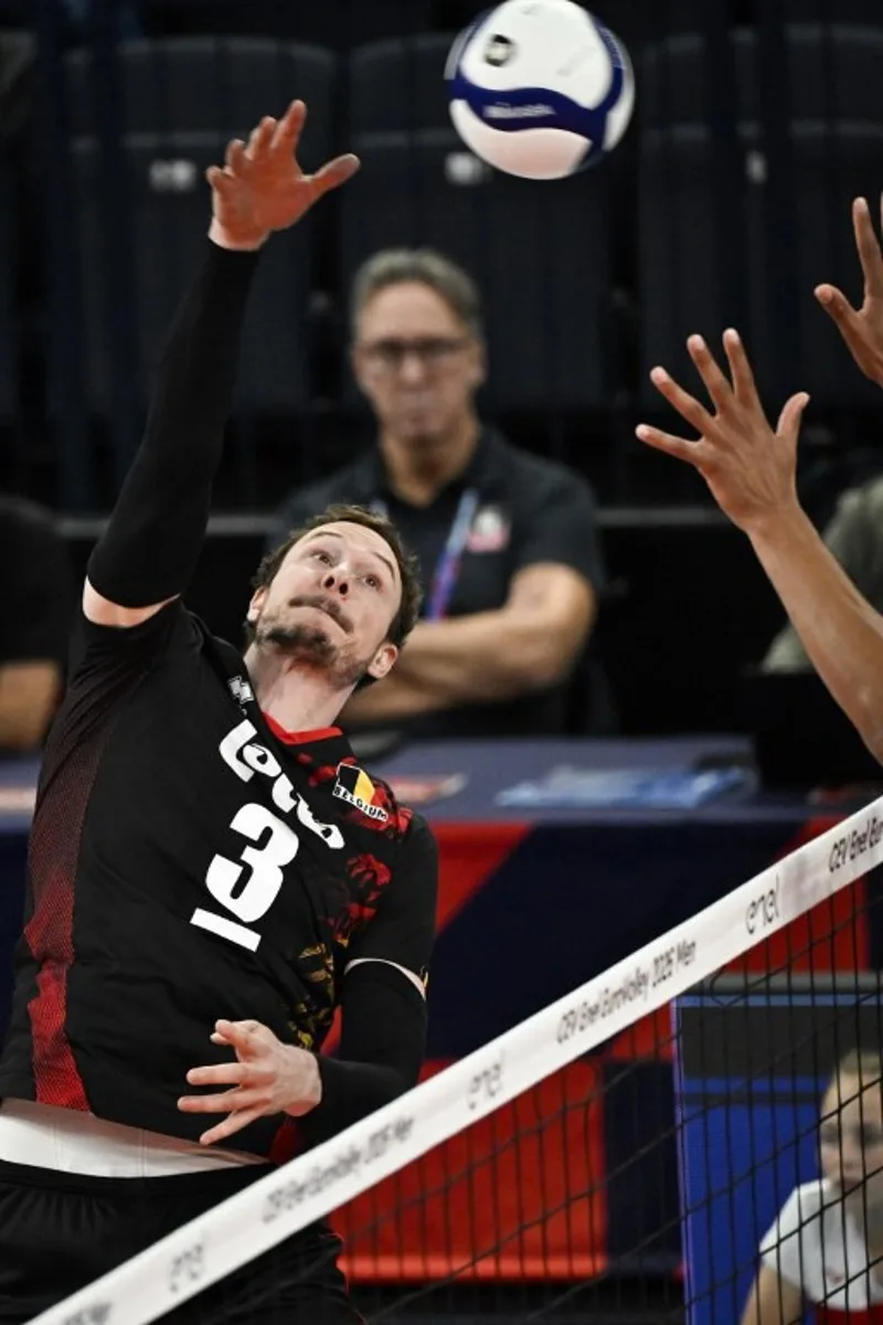 Belgium's Sam Deroo reaches for the ball during the men's volleyball European Championships Pool C match Netherland vs Belgium in Tampere, Finland, on September 11, 2026. Emmi Korhonen / Lehtikuva / AFP