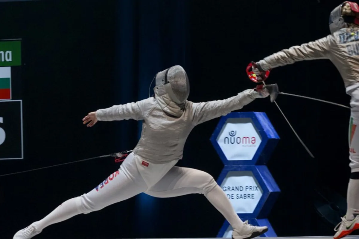 South Korea's Jeon Ha-Young (L) and Bulgaria's Yoana Ilieva (R) compete in the women's sabre individual event as  part of the FIE Orleans Grand Prix in Orleans, on December 7, 2024.  GUILLAUME SOUVANT / AFP