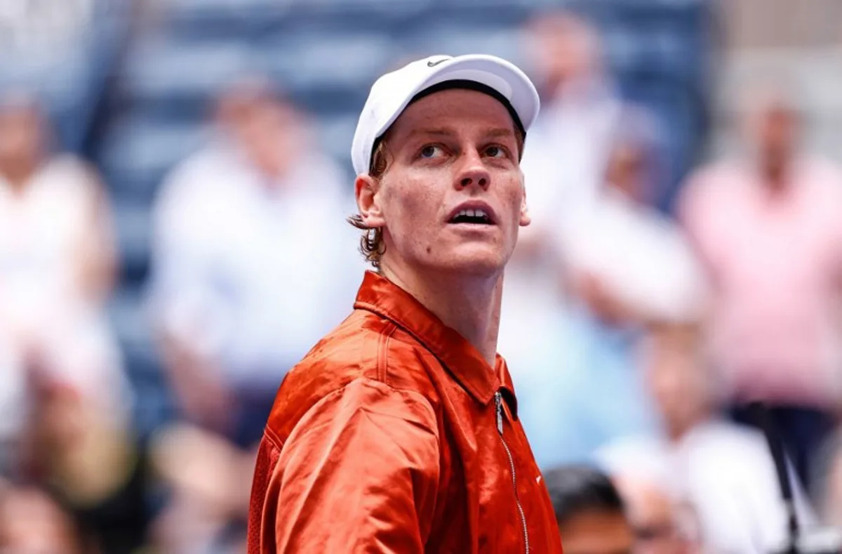 Italy's Jannik Sinner looks to the crowd after winning his men's singles second round tennis match against Australia's Alexei Popyrinon day five of the US Open tennis tournament at the USTA Billie Jean King National Tennis Center in New York City, on August 28, 2025. Kena Betancur / AFP