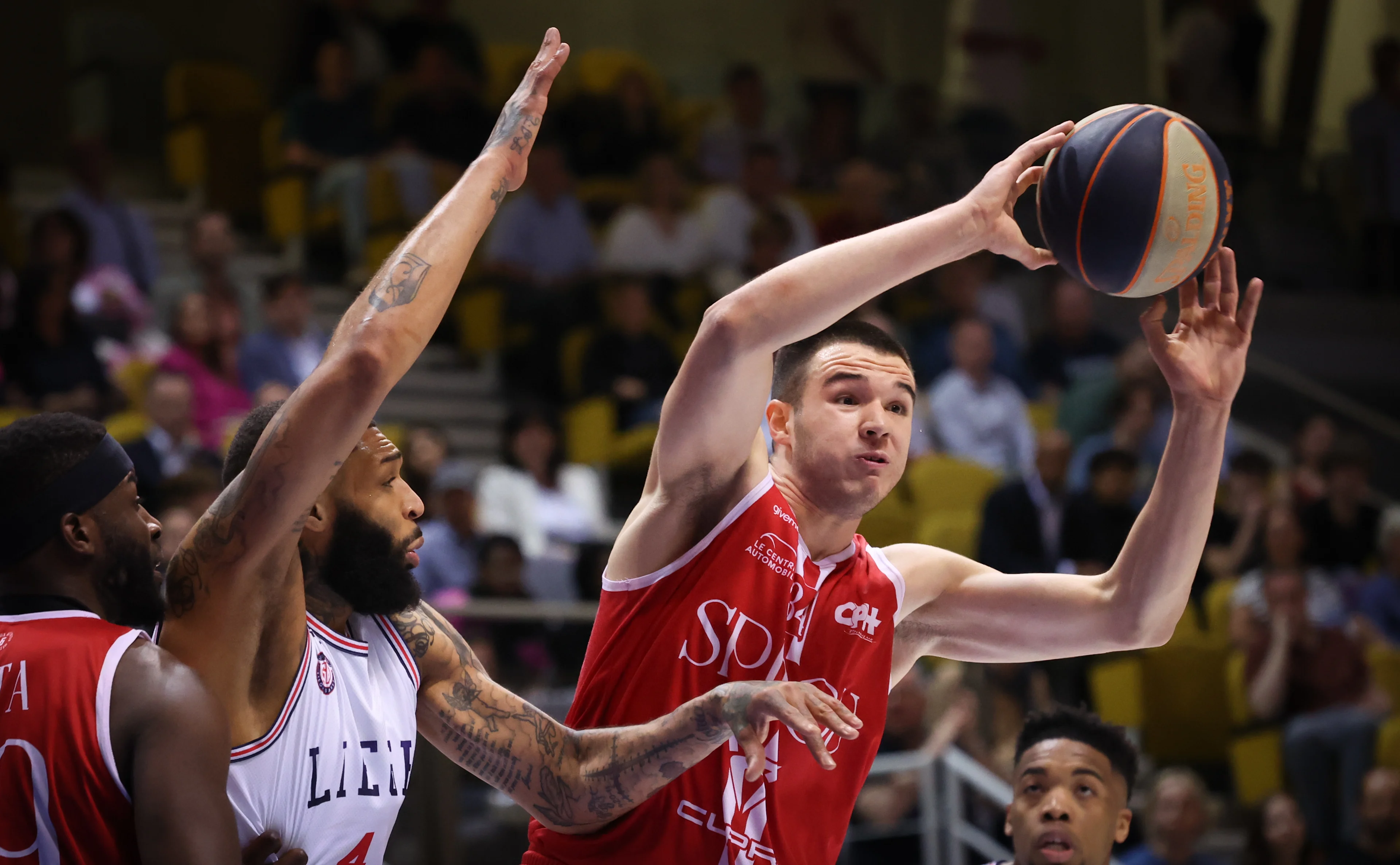 Liege's Jamelle Hagins and Spirou's Bine Prepelic fight for the ball during a basketball match between RSW Liege Basket and Spirou Charleroi, Friday 10 May 2024 in Liege, game 2 (best of 3) in the Belgian Play-offs quarter-finals phase of the 'BNXT League' Belgian and Netherlands first division basket championship. BELGA PHOTO VIRGINIE LEFOUR