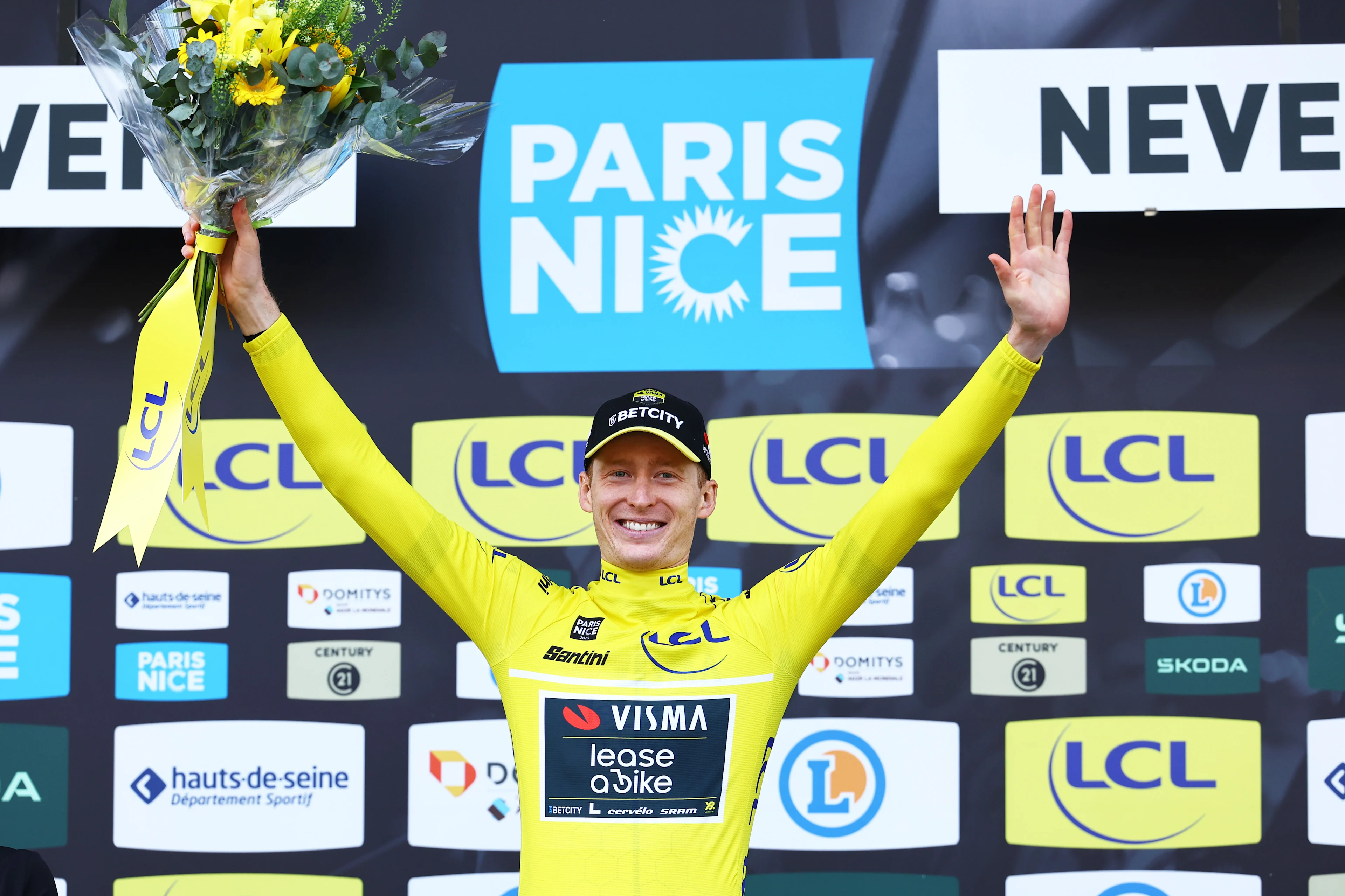 American Matteo Jorgenson of Team Visma-Lease a Bike celebrates in the yellow jersey of leader in the overall ranking after stage three of the 83th edition of the Paris-Nice cycling race, a 28,4km team time trial at the Nevers Magny-Cours racetrack, in Nevers, France, Tuesday 11 March 2025. BELGA PHOTO DAVID PINTENS