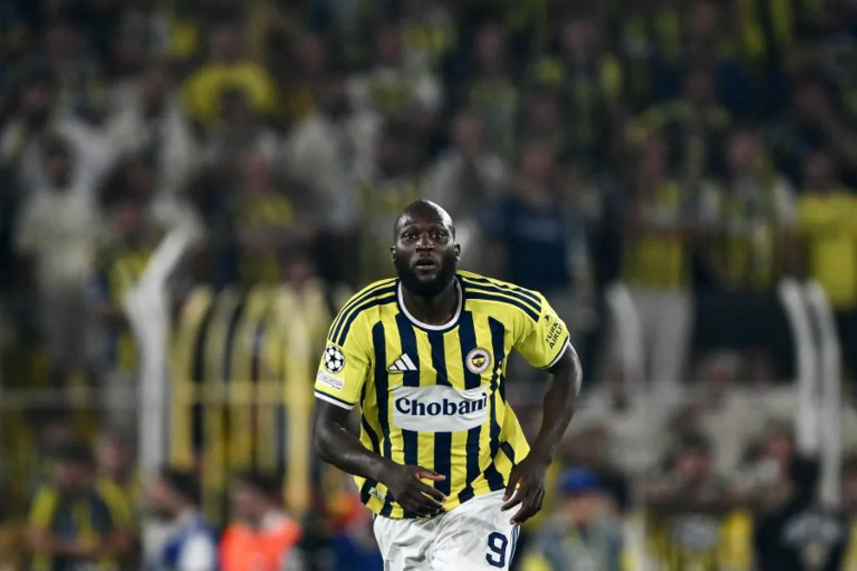 Fenerbahce's Belgian forward #09 Romelu Lukaku reacts during the UEFA Champions League qualifying playoff - first leg football match between Fenerbahce SK and Olympique Lyonnais (OL) at the Sukru Saracoglu Stadium in Istanbul on August 18, 2026. YASIN AKGUL / AFP
