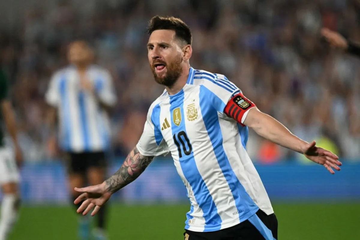 Argentina's forward #10 Lionel Messi celebrates after scoring during the 2026 FIFA World Cup South American qualifiers football match between Argentina and Bolivia at the Mas Monumental stadium in Buenos Aires on October 15, 2024.  Luis ROBAYO / AFP