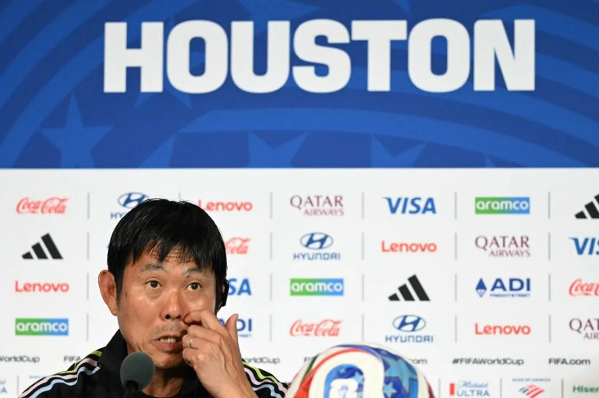 Japan's head coach Hajime Moriyasu speaks during a press conference on the eve of the 2026 World Cup Round of 32 football match between Japan and Brazil at Houston stadium in Houston on June 28, 2026.   RONALDO SCHEMIDT / AFP