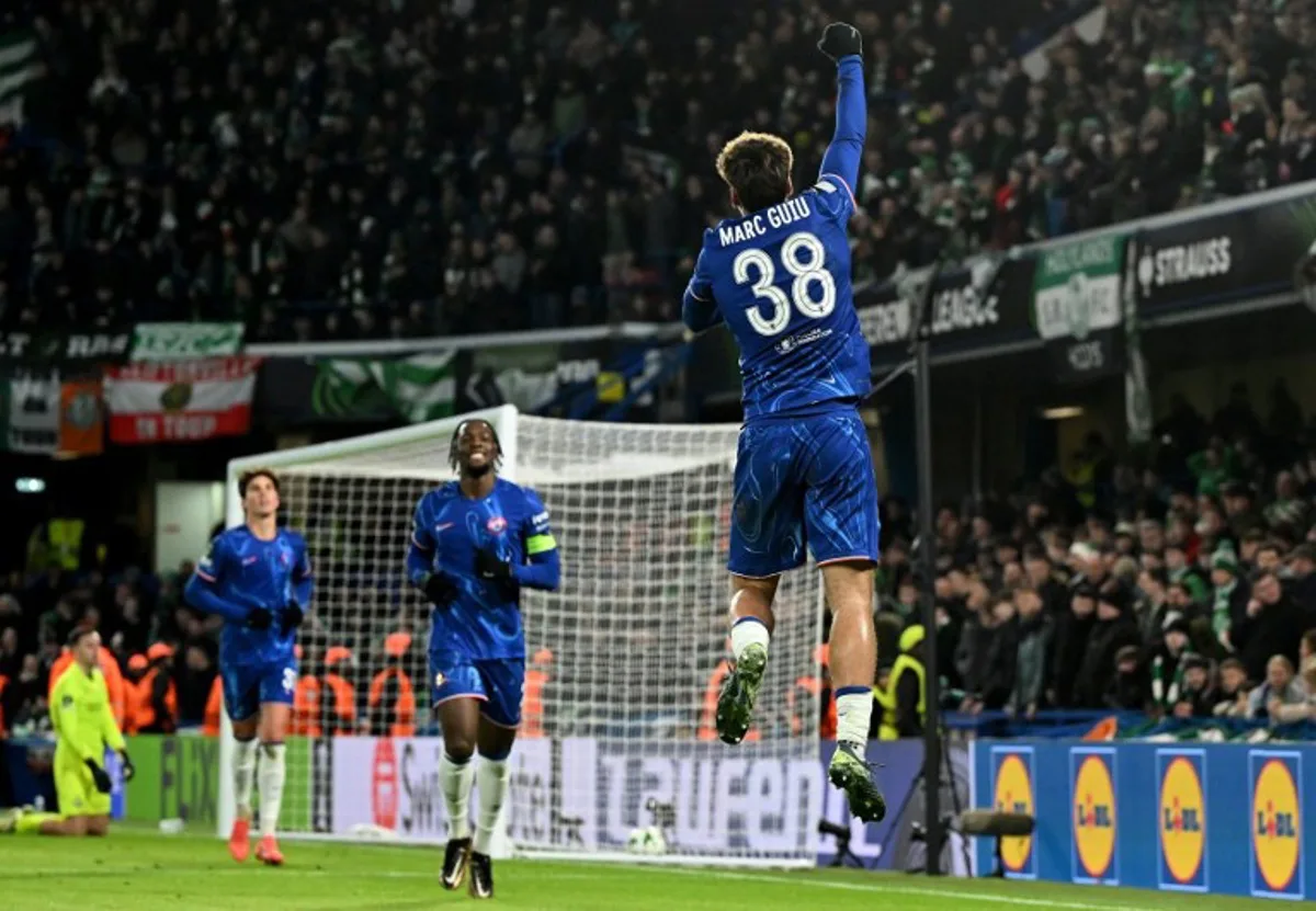 Chelsea's Spanish striker #38 Marc Guiu celebrates his hatrick, the team's fourth goal during the UEFA Europa Conference League football match between Chelsea and Shamrock Rovers at Stamford Bridge in London on December 19, 2024.  JUSTIN TALLIS / AFP