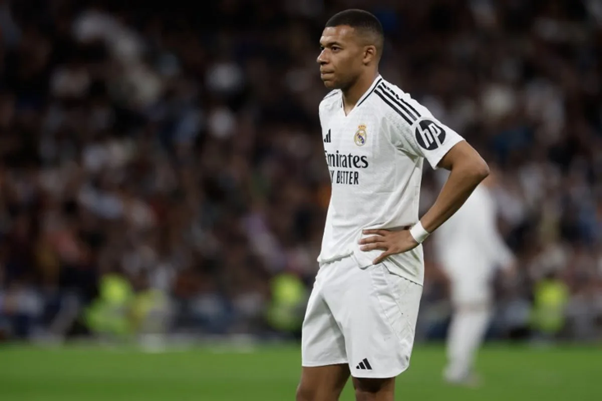 Real Madrid's French forward #09 Kylian Mbappe reacts during the Spanish league football match between Real Madrid CF and RCD Mallorca at the Santiago Bernabeu Stadium in Madrid, on May 14, 2025. Pierre-Philippe MARCOU / AFP