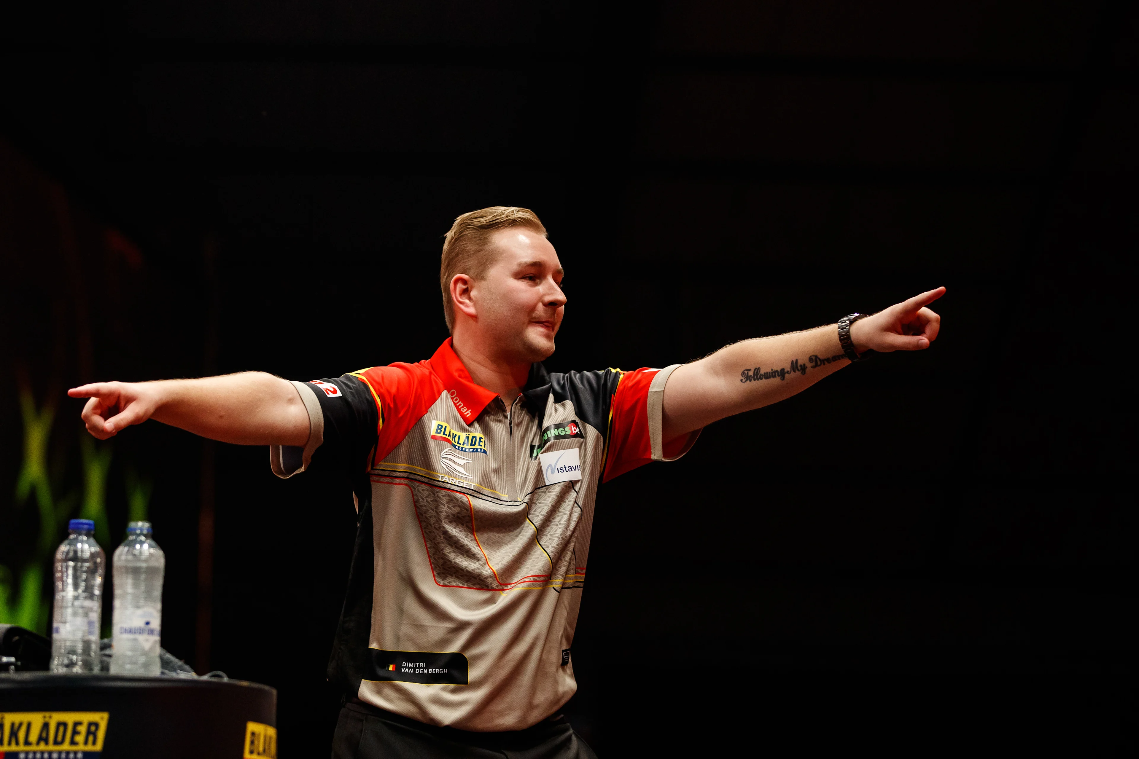 Belgian Dimitri Van den Bergh celebrates on the second day of the Belgian Darts Open, a tournament in the European Tour that takes places from September 23 until September 25 in Wieze, Saturday 24 September 2022. BELGA PHOTO JEF MATTHEE