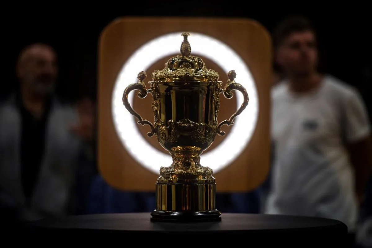 This photograph taken on October 31, 2022 shows the Rugby Union World Cup trophy, the Webb Ellis Cup, presented to the public in the courtyard of the town hall in Toulouse, southwestern France.  Valentine CHAPUIS / AFP