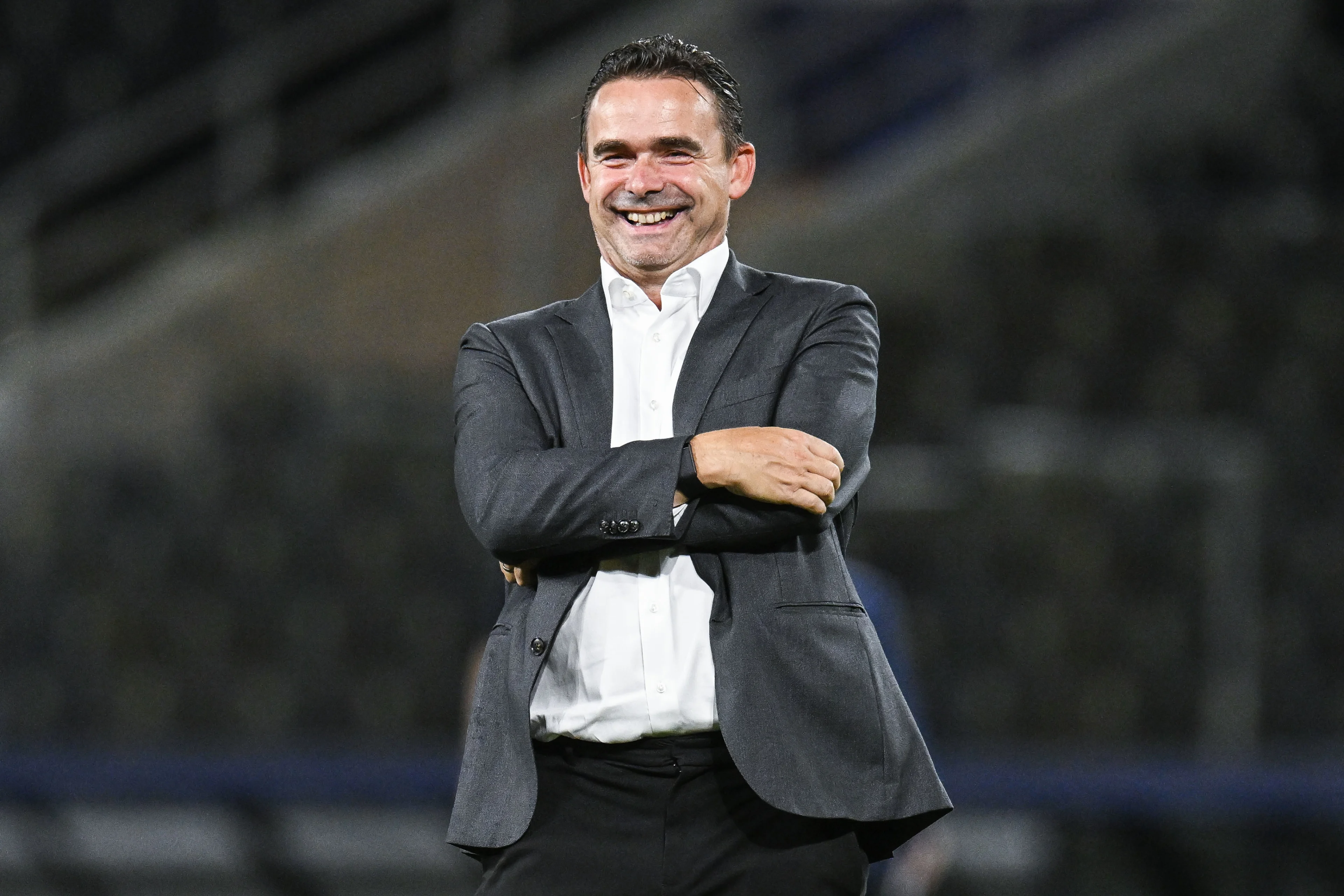 Antwerp's director of football Marc Overmars celebrates after winning a soccer game between Greek AEK Athens FC and Belgian soccer team Royal Antwerp FC, Wednesday 30 August 2023 in Athens, Greece, the return leg of the play-offs for the UEFA Champions League competition. BELGA PHOTO TOM GOYVAERTS