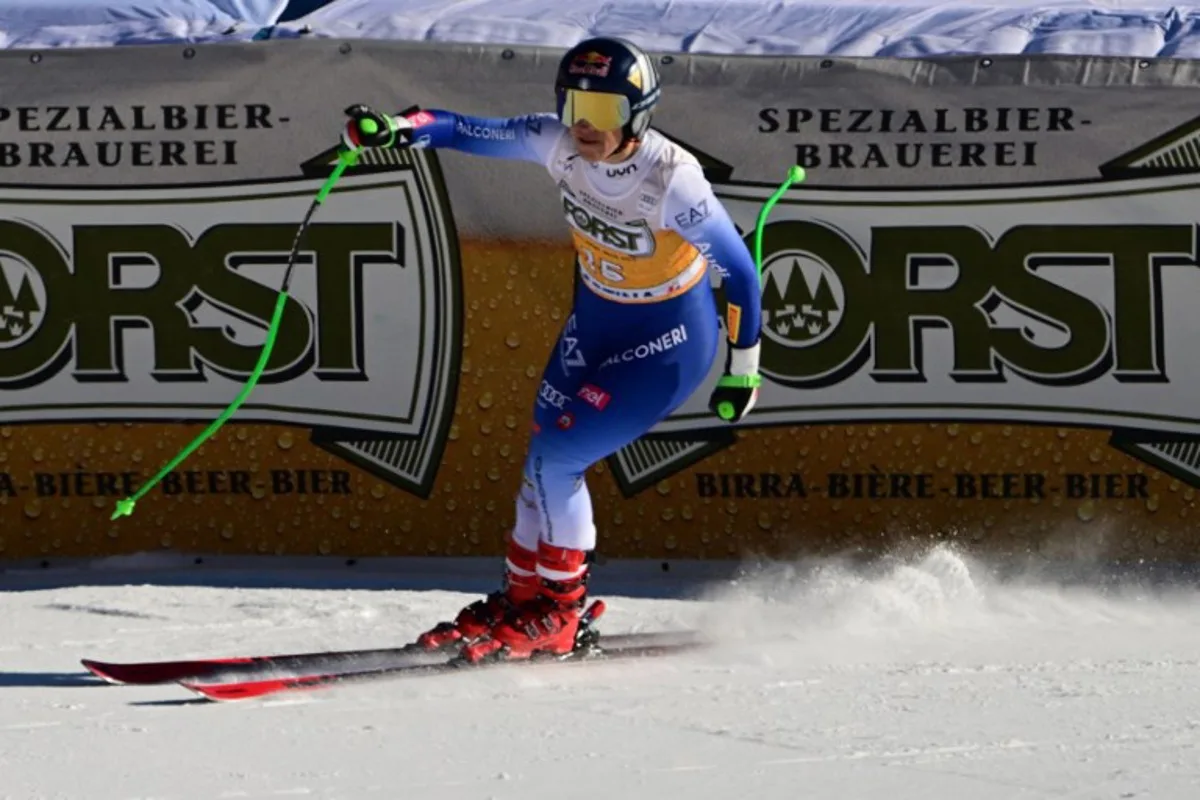 Italy's Sofia Goggia reacts in the finish area after the Women's Downhill event of FIS Alpine Skiing World Cup in Cortina d'Ampezzo, Italy on January 18, 2025.  Tiziana FABI / AFP