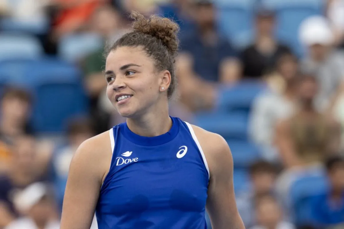 Italy's Jasmine Paolini reacts after a point against France's Chloe Paquet during their women's singles match at the United Cup tennis tournament on Ken Rosewall Arena in Sydney on December 31, 2024.  Steve CHRISTO / AFP