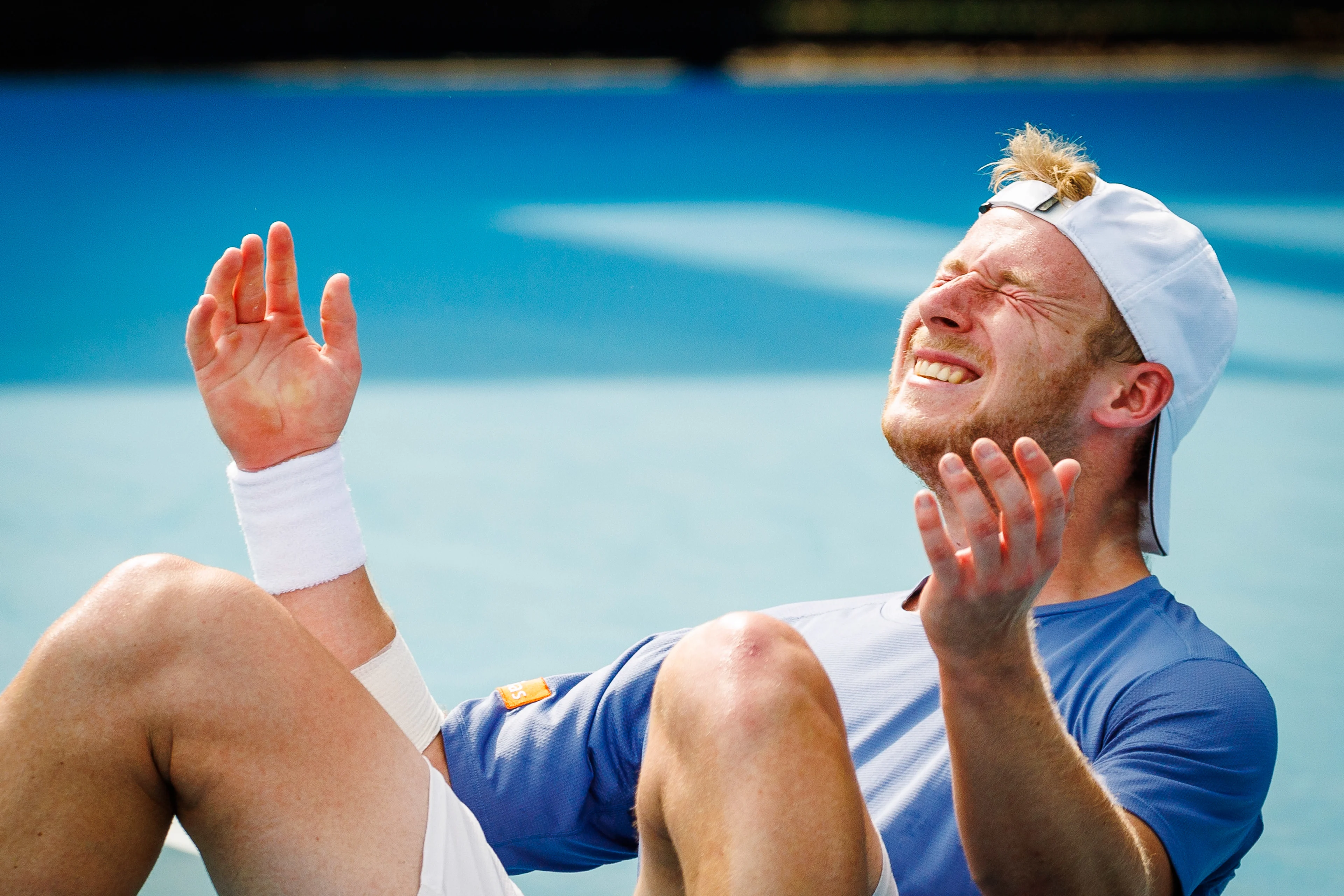 Belgian Gauthier Onclin celebrates during a tennis match against American McDonald, in the third round of the qualifiers for the men's singles tournament, at the 'Australian Open' Grand Slam tennis tournament, Thursday 09 January 2025 in Melbourne Park, Melbourne, Australia. The 2024 edition of the Australian Grand Slam takes place from January 14th to January 28th. BELGA PHOTO PATRICK HAMILTON