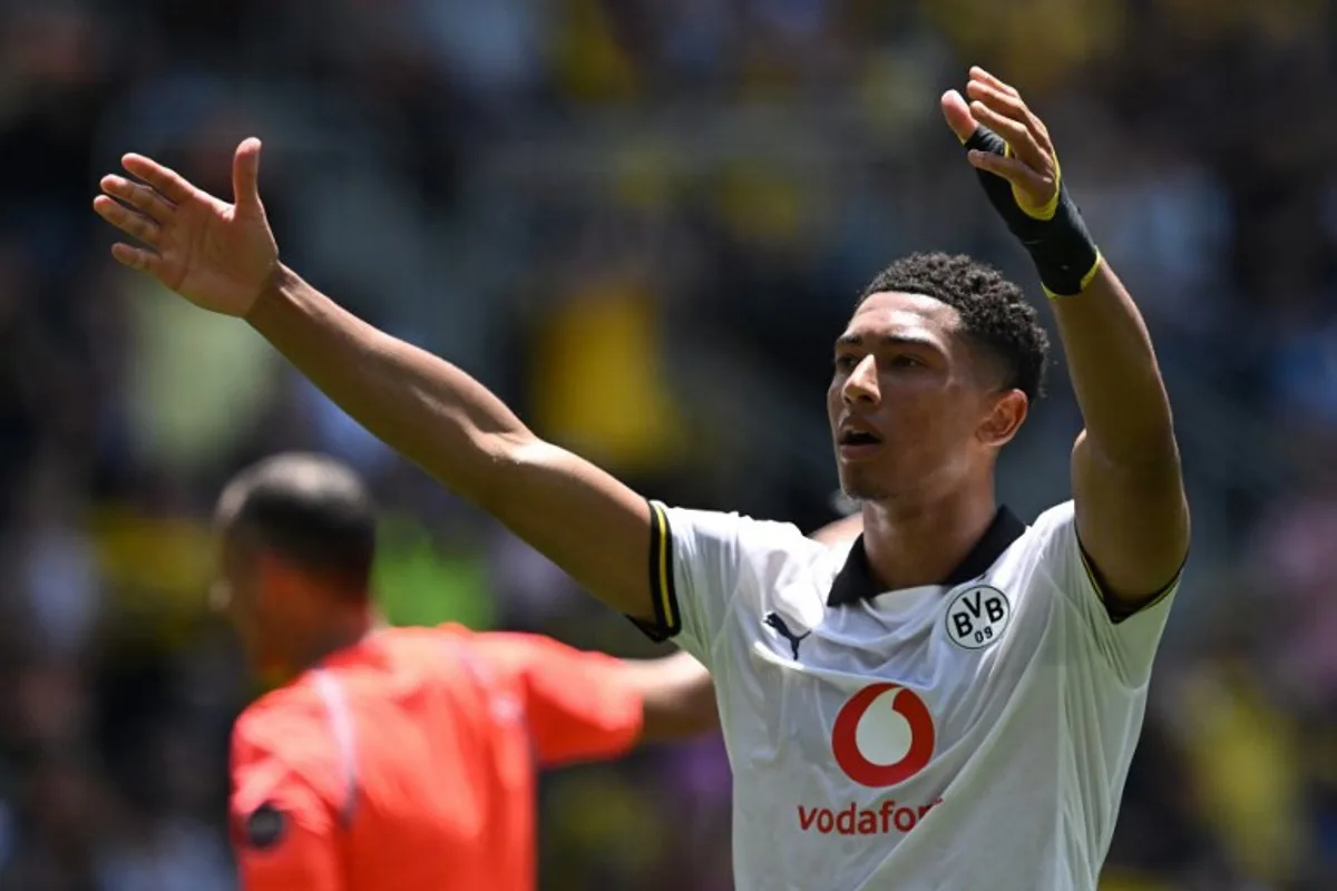 Borussia Dortmund's English midfielder #77 Jobe Bellingham celebrates scoring his team's third goal during the FIFA Club World Cup 2025 Group F football match between South Africa's Mamelodi Sundowns and Germany's Borussia Dortmund at the TQL stadium in Cincinnati on June 21, 2025. Federico PARRA / AFP