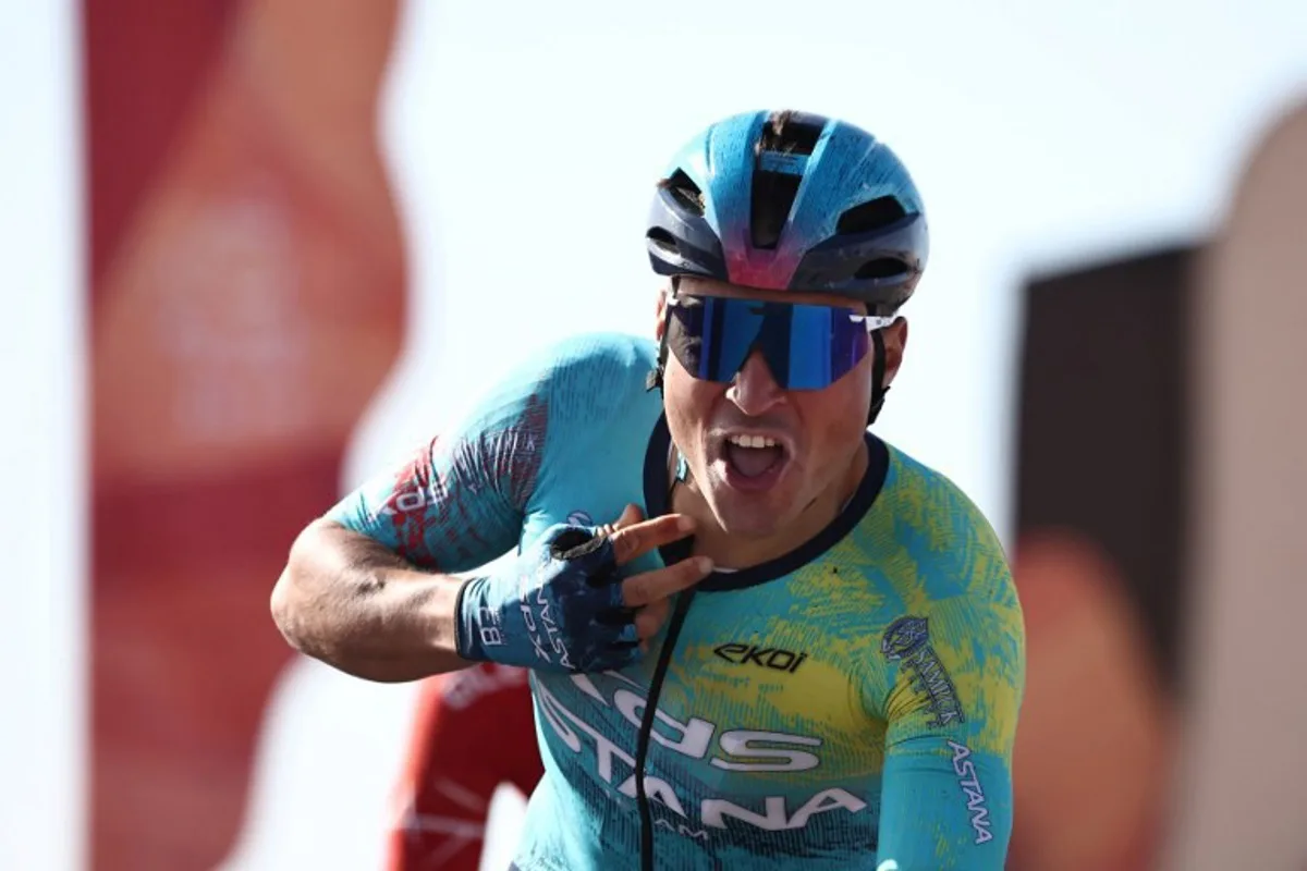 XDS Astana Team Italian Matteo Malucelli celebrates as he crosses the finish ligne to winn the fourth stage of the AlUla Tour cycling race, 173,4 km from Winter Park to Hegra on January 30, 2026. Anne-Christine POUJOULAT / AFP