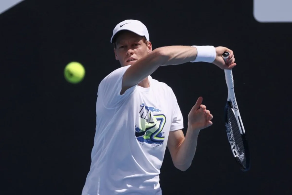 Italy's Jannik Sinner hits a return during a practice session ahead of the Australian Open tennis tournament in Melbourne on January 10, 2025.  David GRAY / AFP