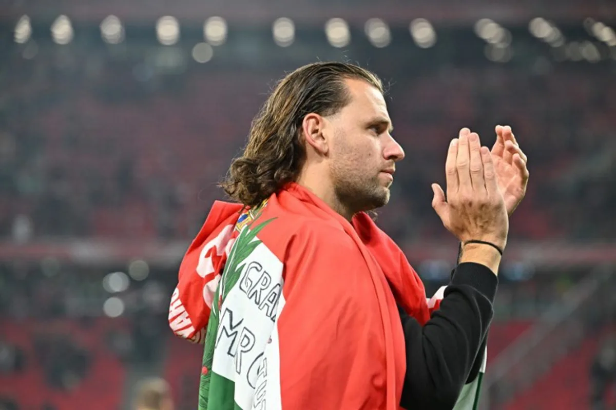 Hungary's forward Adam Szalai reacts after his last international match after the UEFA Nations League Group 3 football match between Hungary and Italy in Budapest on September 26, 2022.  Attila KISBENEDEK / AFP