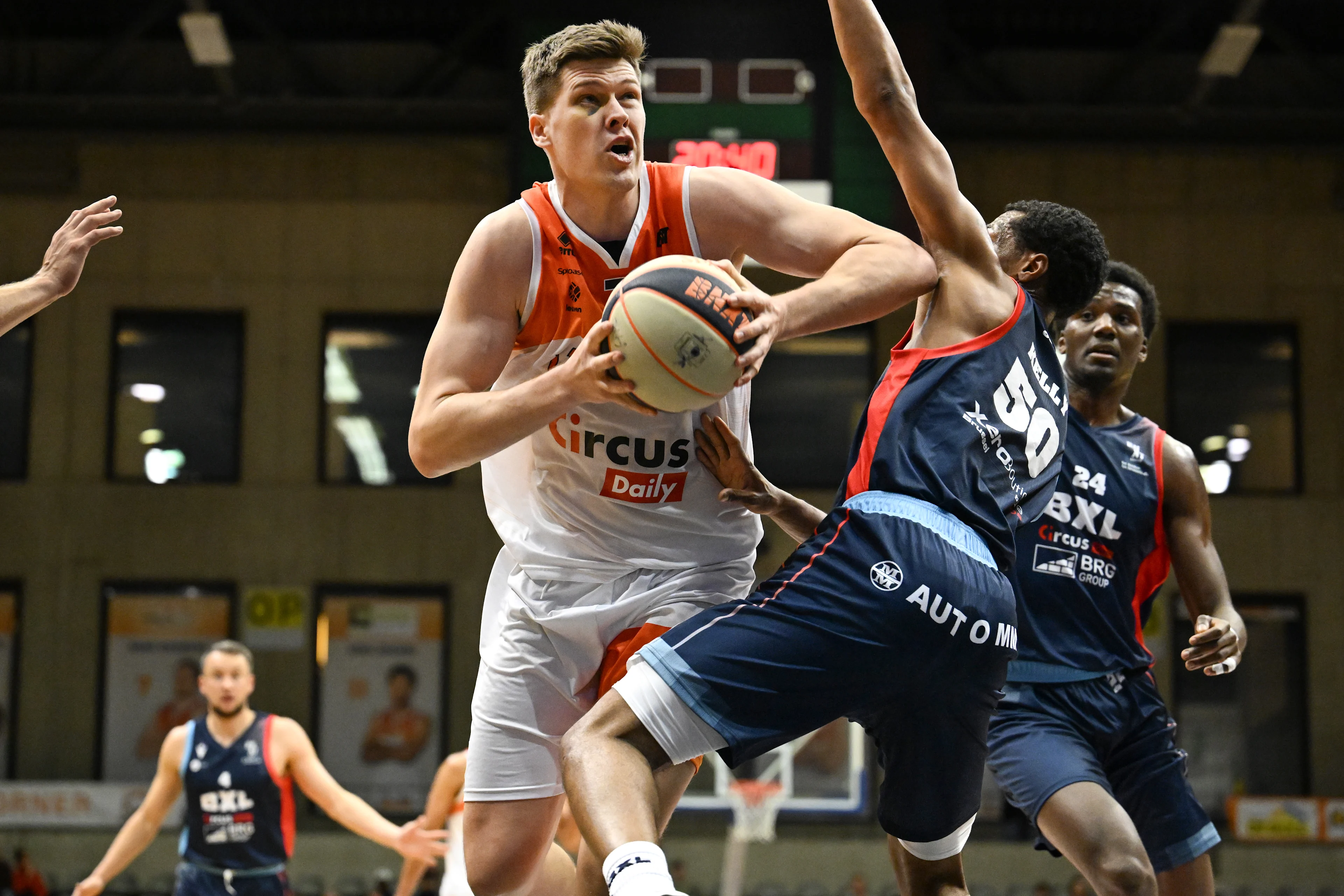 Leuven's Mattias Palinckx and Brussels' Raijon Kelly fight for the ball during a basketball match between Leuven Bears and Brussels Basketball, Saturday 01 February 2025 in Leuven, on day 21 of the 'BNXT League' Belgian/ Dutch first division basket championship. BELGA PHOTO MAARTEN STRAETEMANS