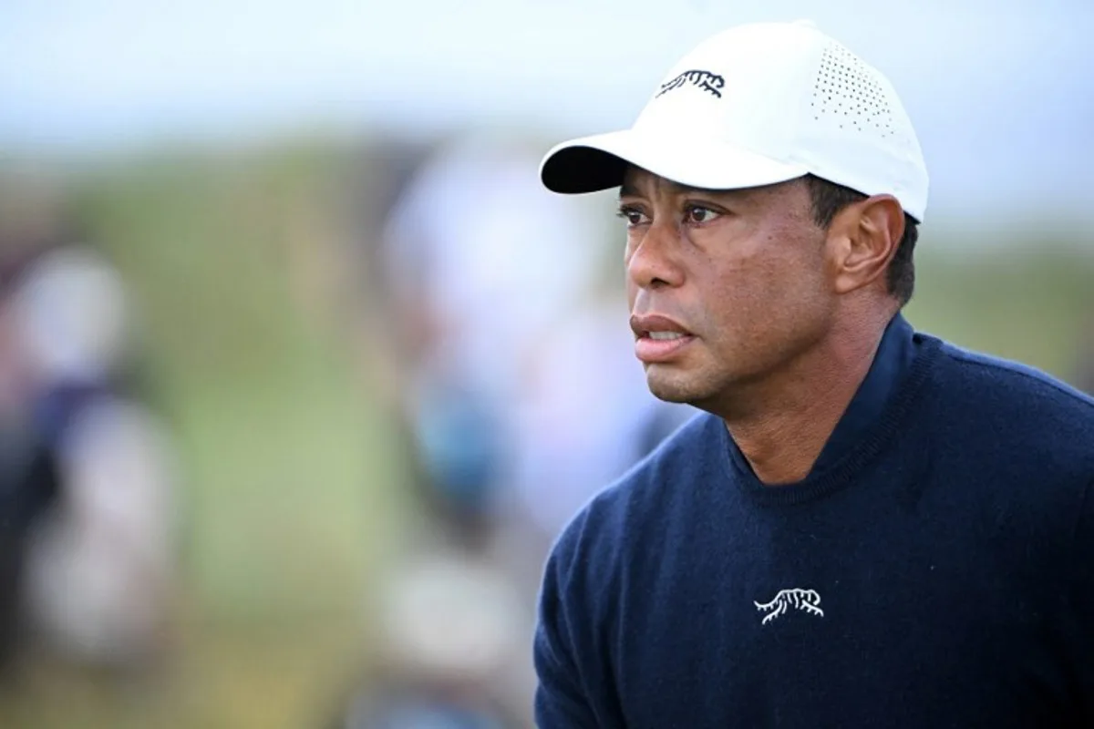 US golfer Tiger Woods reacts after driving from the 4th tee during his second round, on day two of the 152nd British Open Golf Championship at Royal Troon on the south west coast of Scotland on July 19, 2024.  ANDY BUCHANAN / AFP