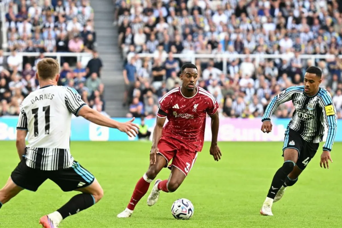 Liverpool's Dutch midfielder #38 Ryan Gravenberch runs with the ball during the English Premier League football match between Newcastle United and Liverpool at St James' Park in Newcastle-upon-Tyne, north east England on August 23, 2026. Paul ELLIS / AFP