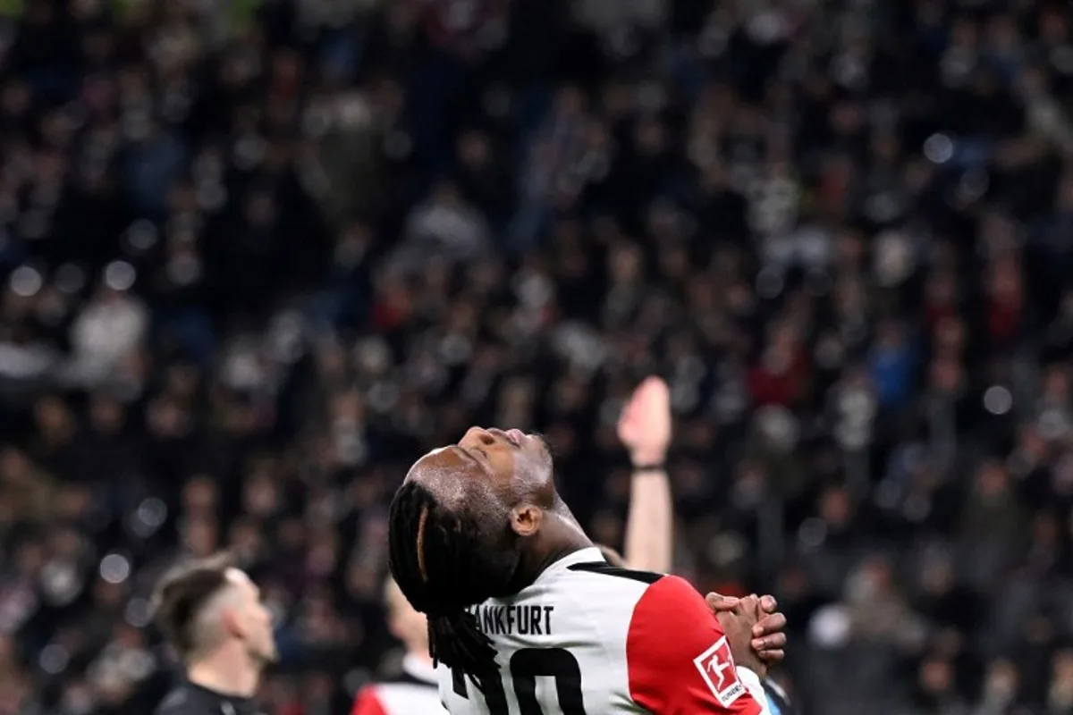 Michy Batshuayi reacts during the German first division Bundesliga football match between Eintracht Frankfurt and Bayer 04 Leverkusen in Frankfurt on March 1, 2025.  Kirill KUDRYAVTSEV / AFP