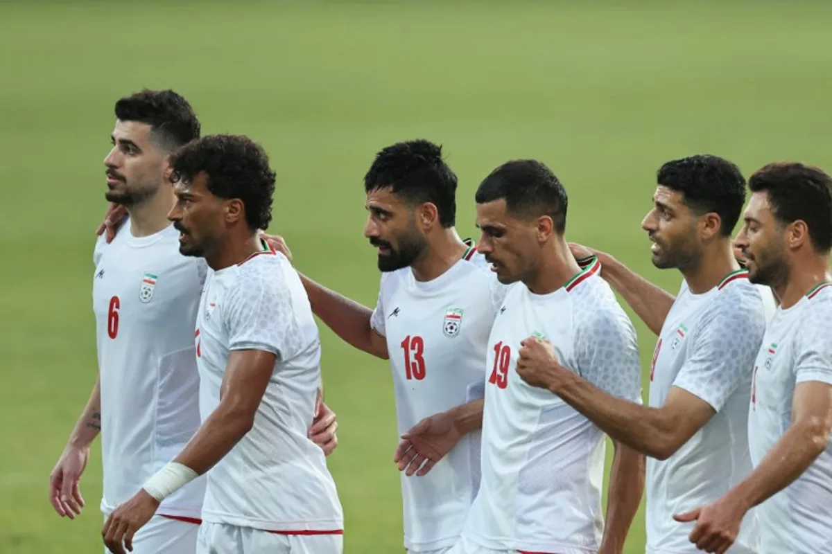 Iran's Forward #23 Ramin Rezaeian celebrates with teammates after scoring their side's second goal during an international friendly football match between Iran and Gambia, in Antalya, southern Turkey, May 29, 2026, as part of Iran's preparation for the upcoming football World Cup. Oner SAN / AFP