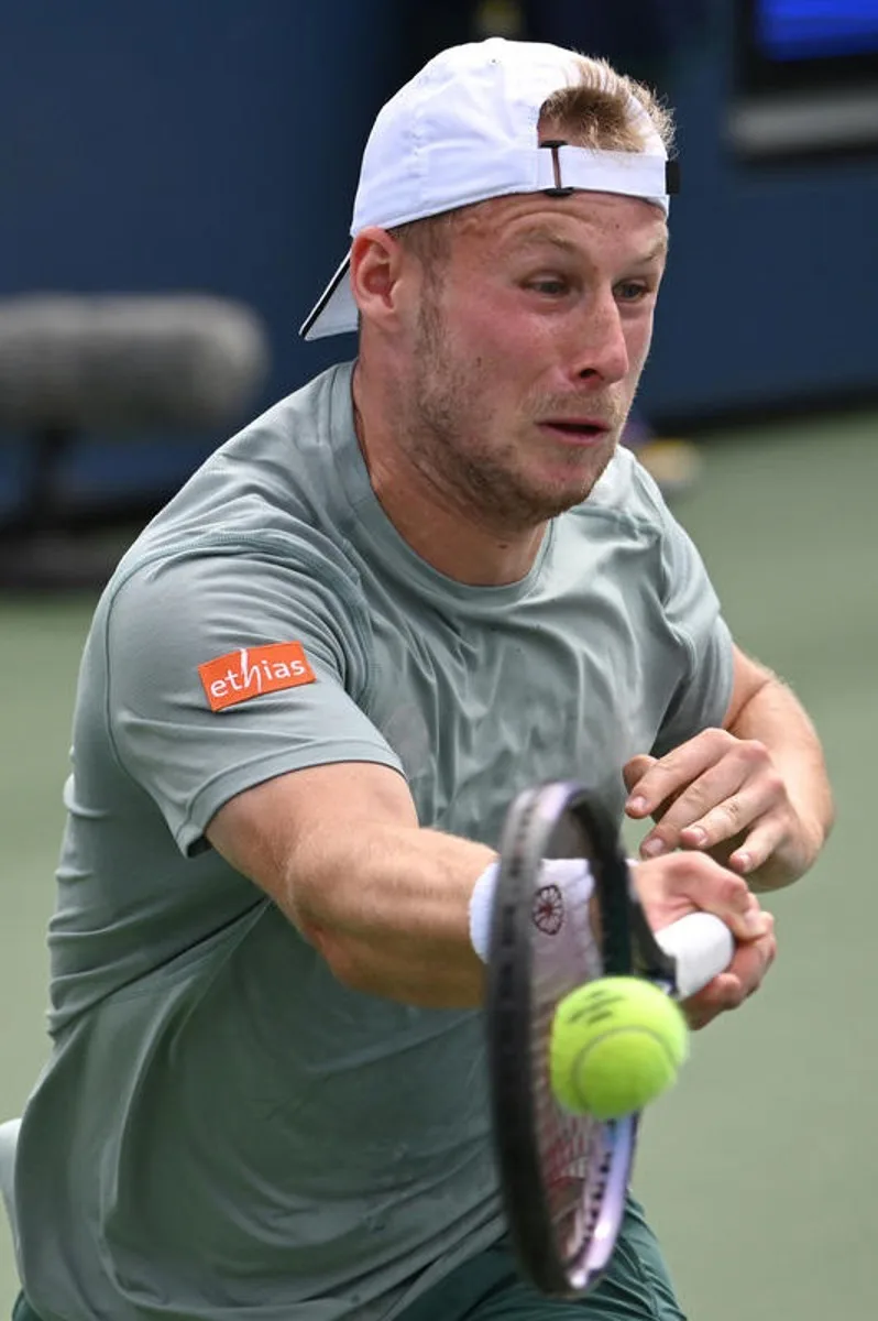 Gauthier Onclin of Belgium plays against Nikoloz Basilashvili of Georgia during the Men's Qualifying Singles Round 1 of the 2025 US Open tournament, at the USTA Billie Jean King National Tennis Center in Flushing Meadow-Corona Park, in the Queens borough of New York, NY, August 18, 2025. (Photo by Anthony Behar/SipaUSA)