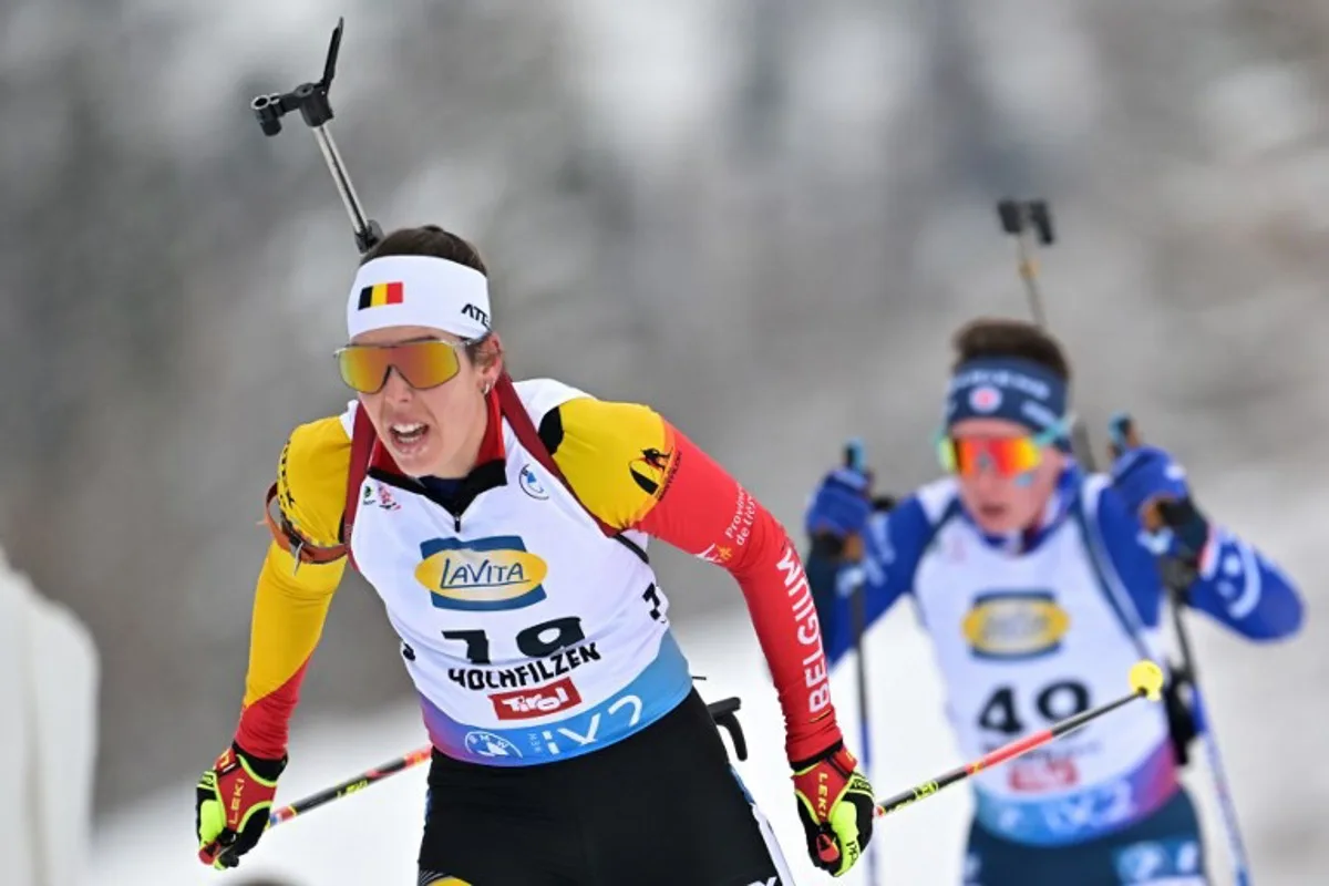 Belgium's Lotte Lie competes ahead of USA's Jackie Garso in the women's 7,5 km sprint event of the IBU Biathlon World Cup in Hochfilzen, Austria, on December 8, 2023.  Joe Klamar / AFP