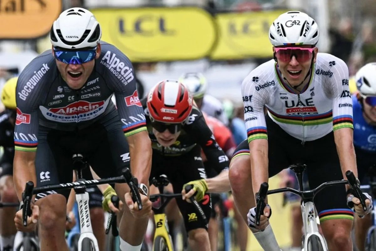 Alpecin - Deceuninck team's Dutch rider Mathieu van der Poel (L) sprints to the finish line to win ahead of UAE Team Emirate - XRG team's Slovenian rider Tadej Pogacar, taking second place and Team Visma - Lease a bike team's Danish rider Jonas Vingegaard (C) taking third place during the 2nd stage of the 112th edition of the Tour de France cycling race, 209.1 km between Lauwin-Planque and Boulogne-sur-Mer, Northern France, on July 6, 2025. Loic VENANCE / AFP