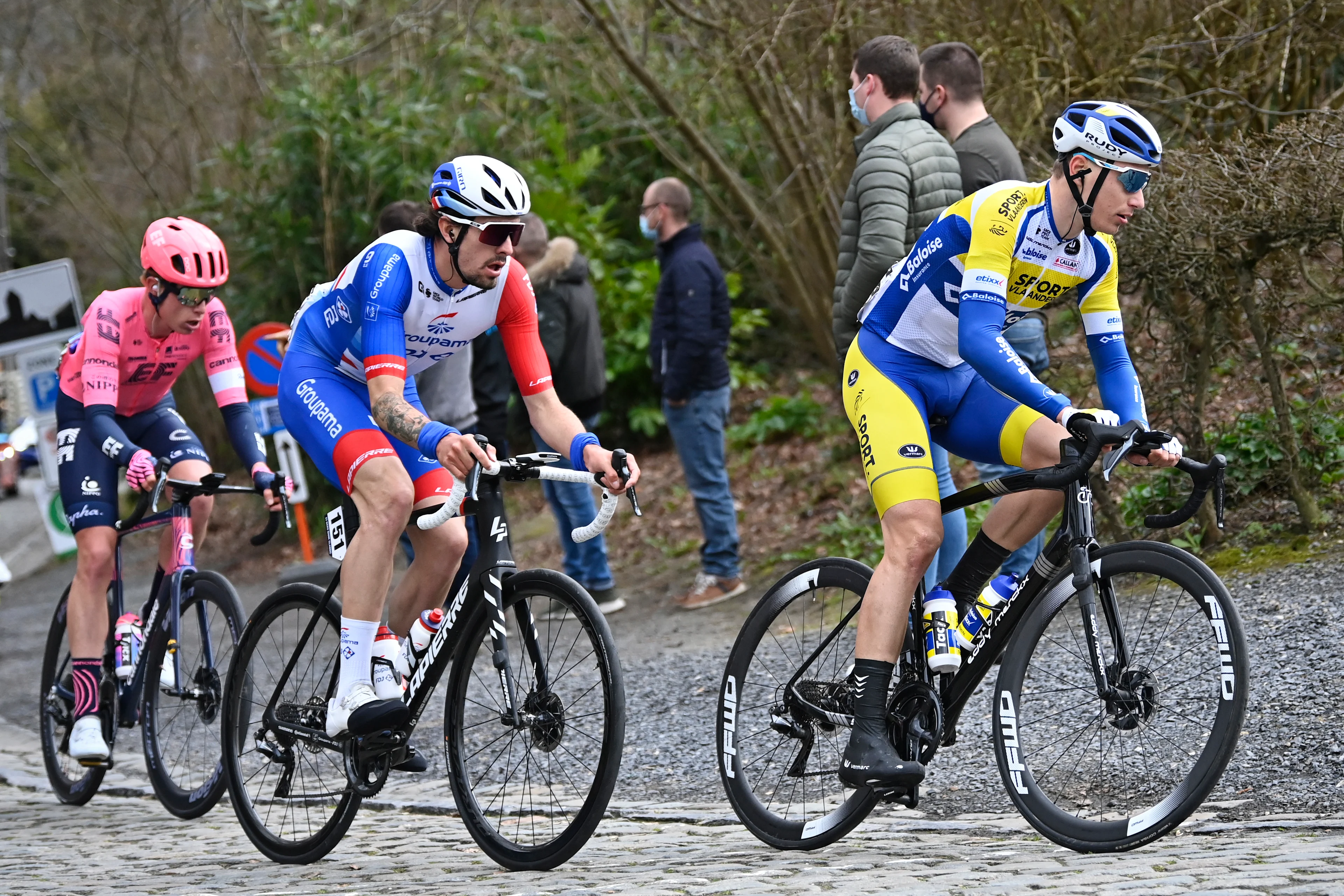 French Alexys Brunel of Groupama-FDJ and Belgian Lindsay De Vylder of Sport Vlaanderen-Baloise pictured in action during the 'E3 Saxo Bank Classic' cycling race, 203,9km from and to Harelbeke, Friday 26 March 2021. BELGA PHOTO DIRK WAEM