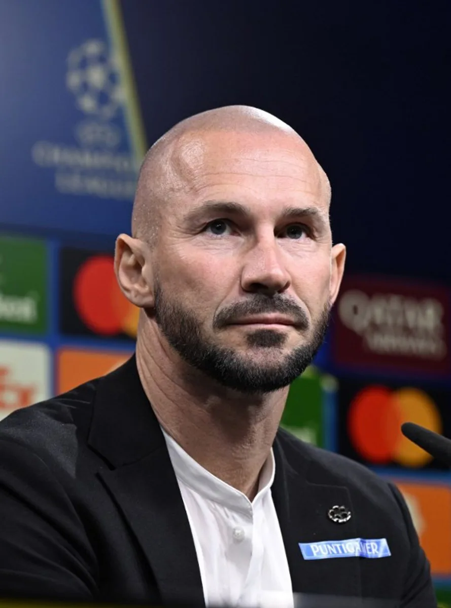 Sturm Graz's Austrian head coach Christian Ilzer addresses a press conference on the eve of the UEFA Champions League football match between BVB Borussia Dortmund and Sturm Graz in Dortmund, western Germany, on November 4, 2024.  Ina FASSBENDER / AFP